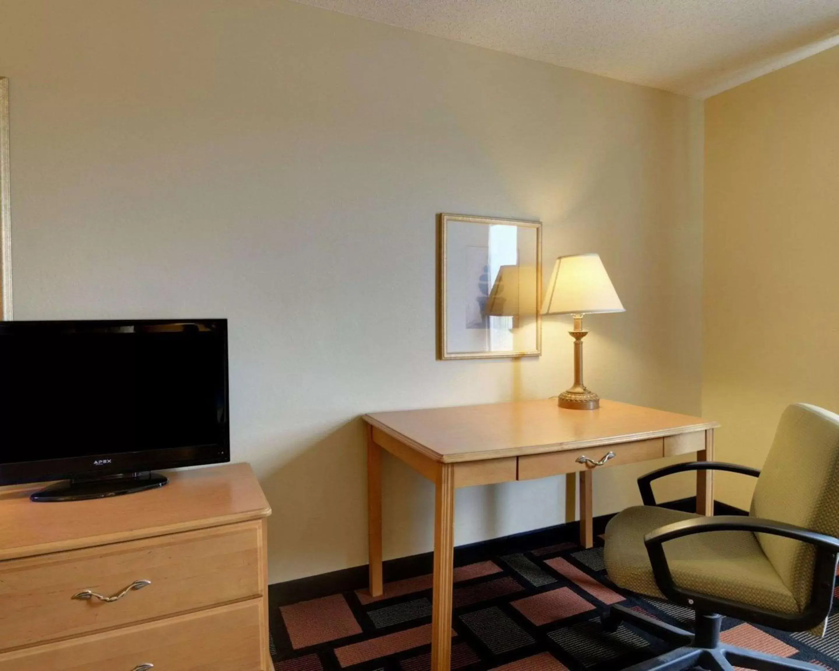 Photo of the whole room, TV/Entertainment Center in Quality Inn & Suites