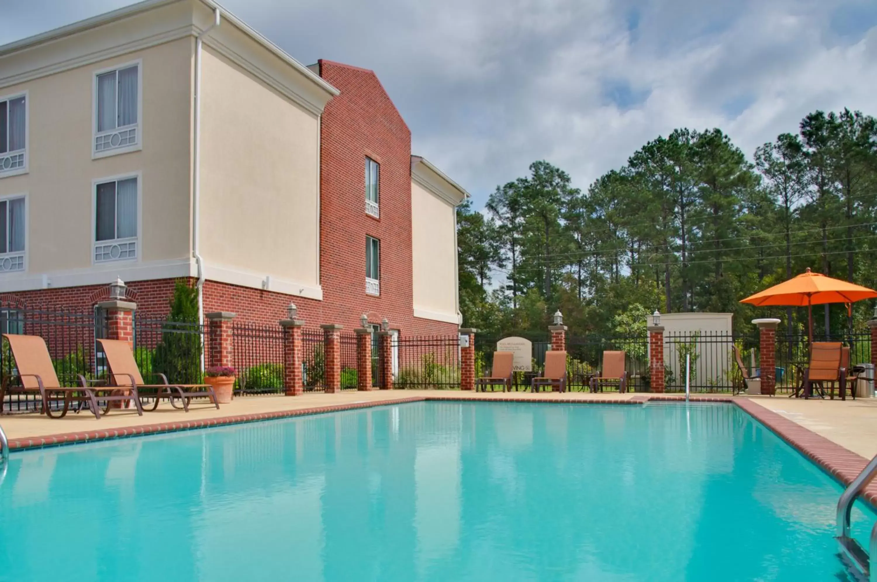 Swimming pool, Property Building in Holiday Inn Express Hotel and Suites Natchitoches, an IHG Hotel