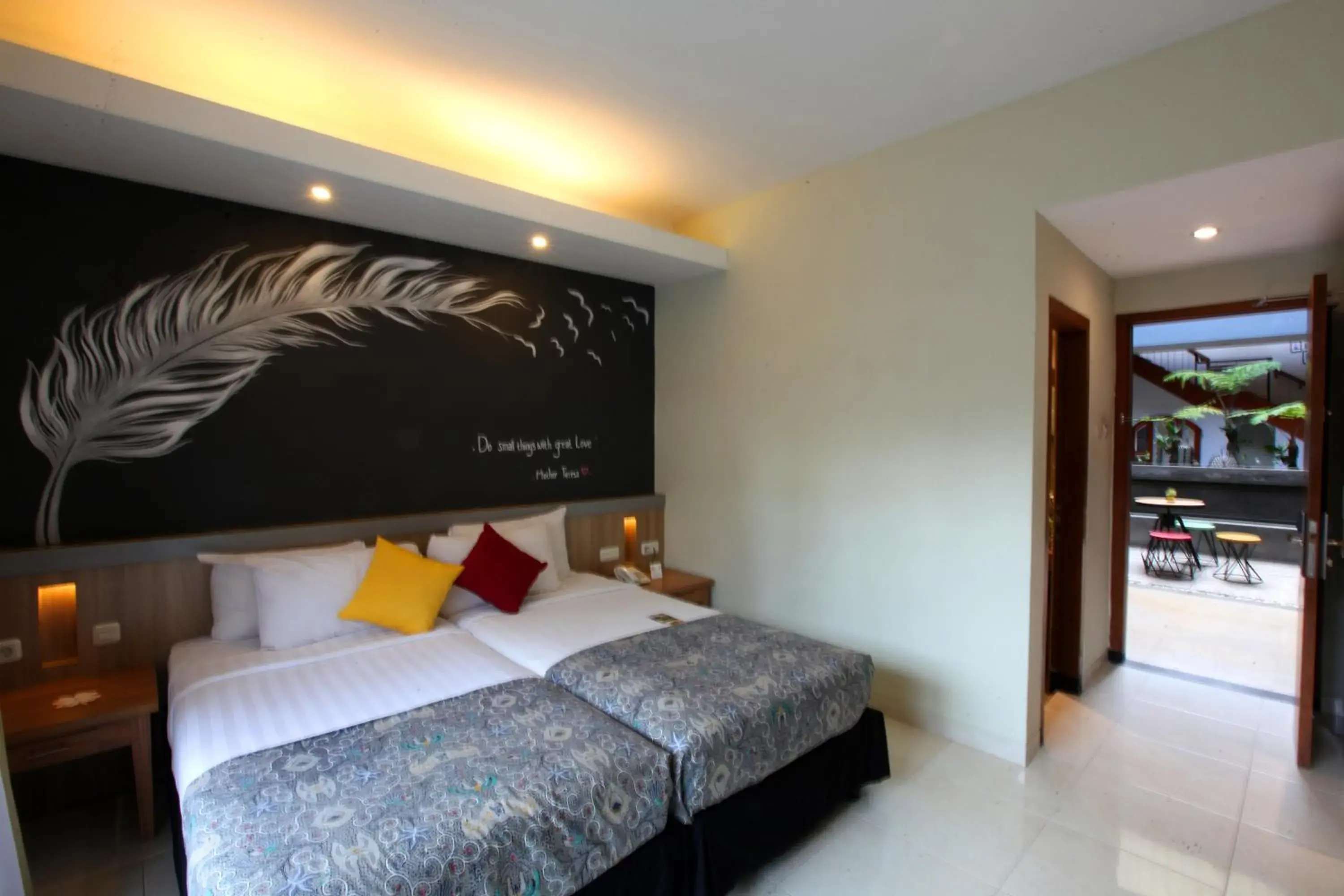 Bed in Hotel Sriti Magelang