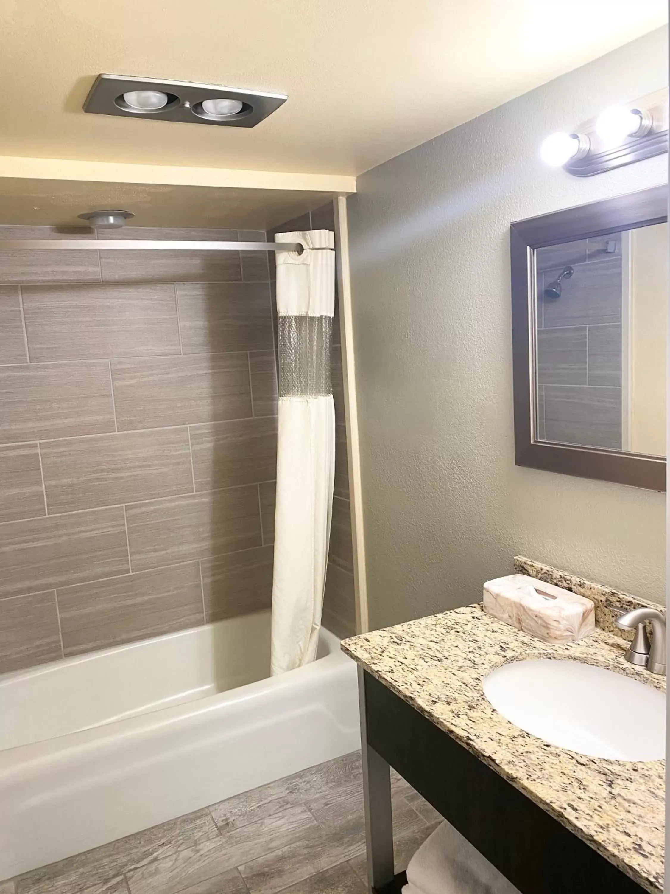 Bathroom in Super 8 by Wyndham Marysville/Port Huron Area