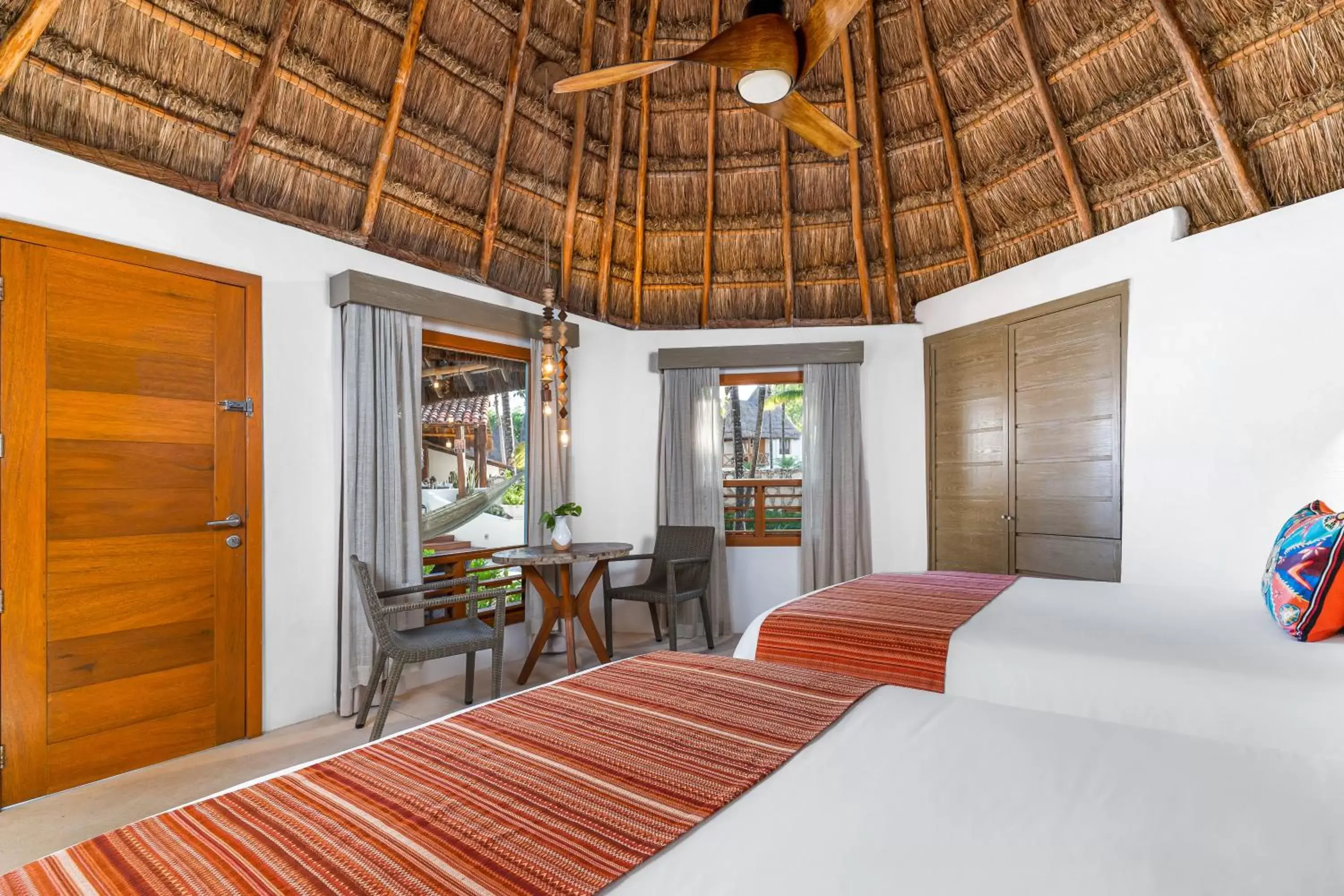 Bedroom in Mahekal Beach Front Resort & Spa