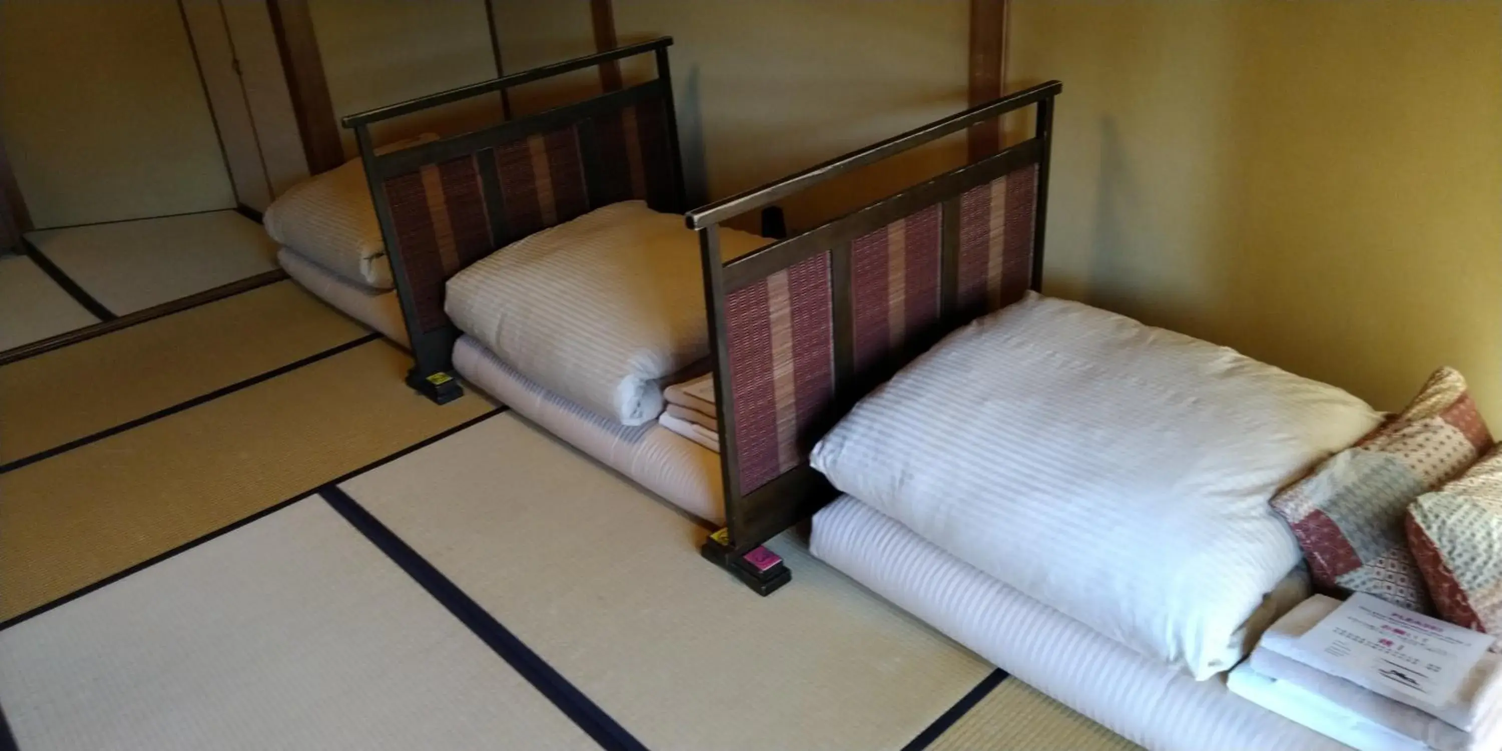 Bed in K's House Ito Onsen - Historical Ryokan Hostel