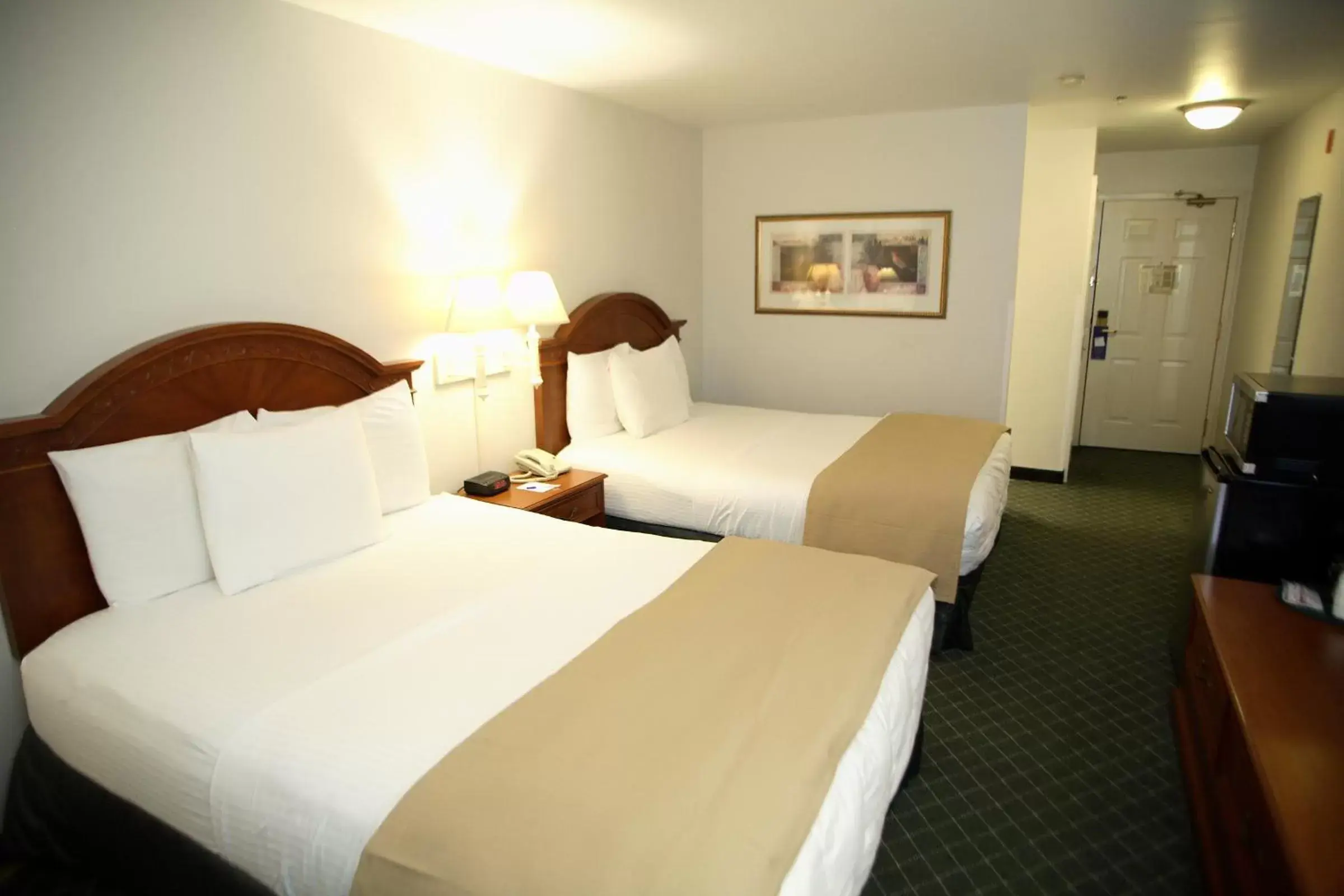 Bed in Baymont INN & Suites by Wyndham