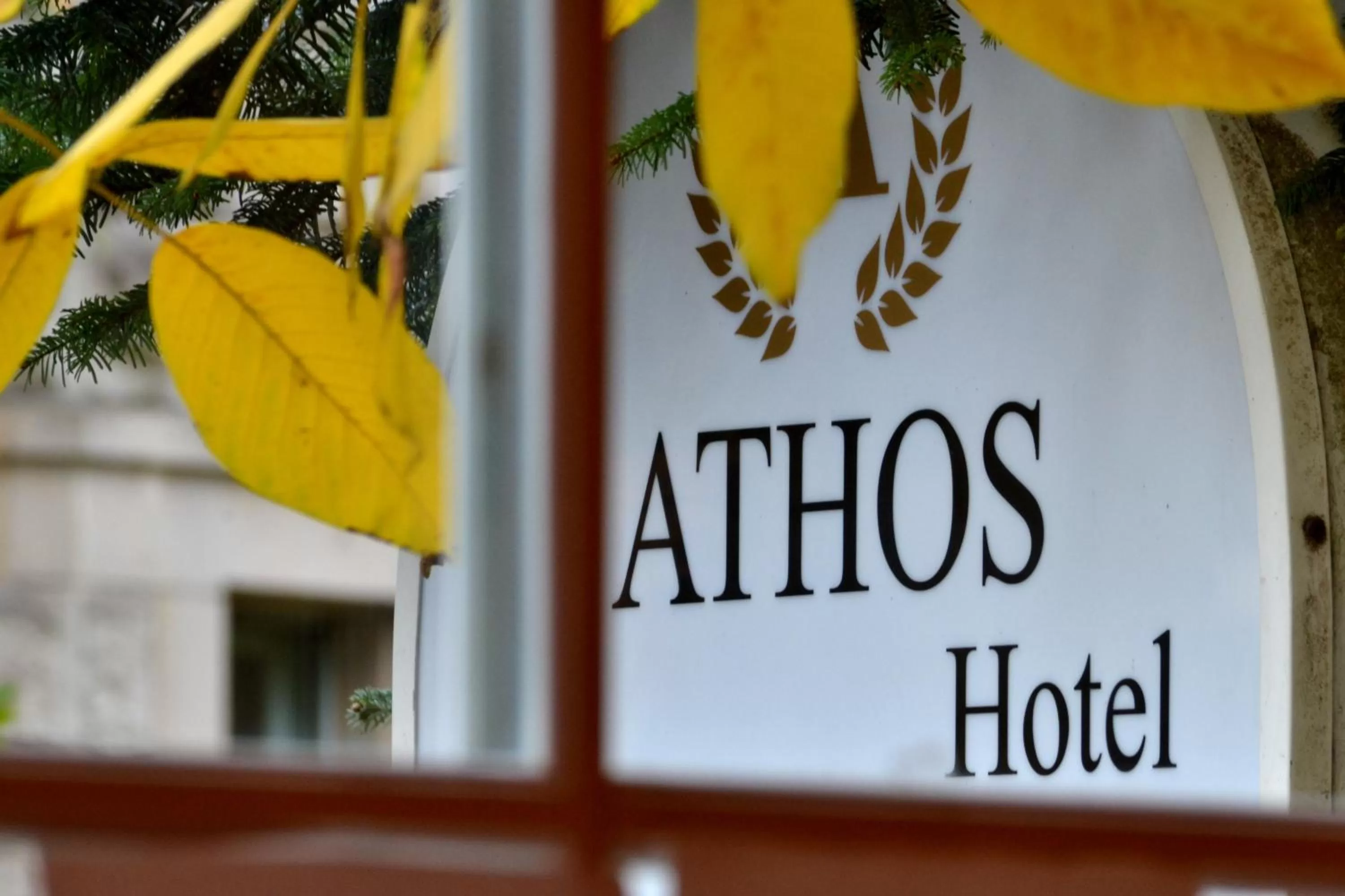 Property logo or sign in Hotel Athos