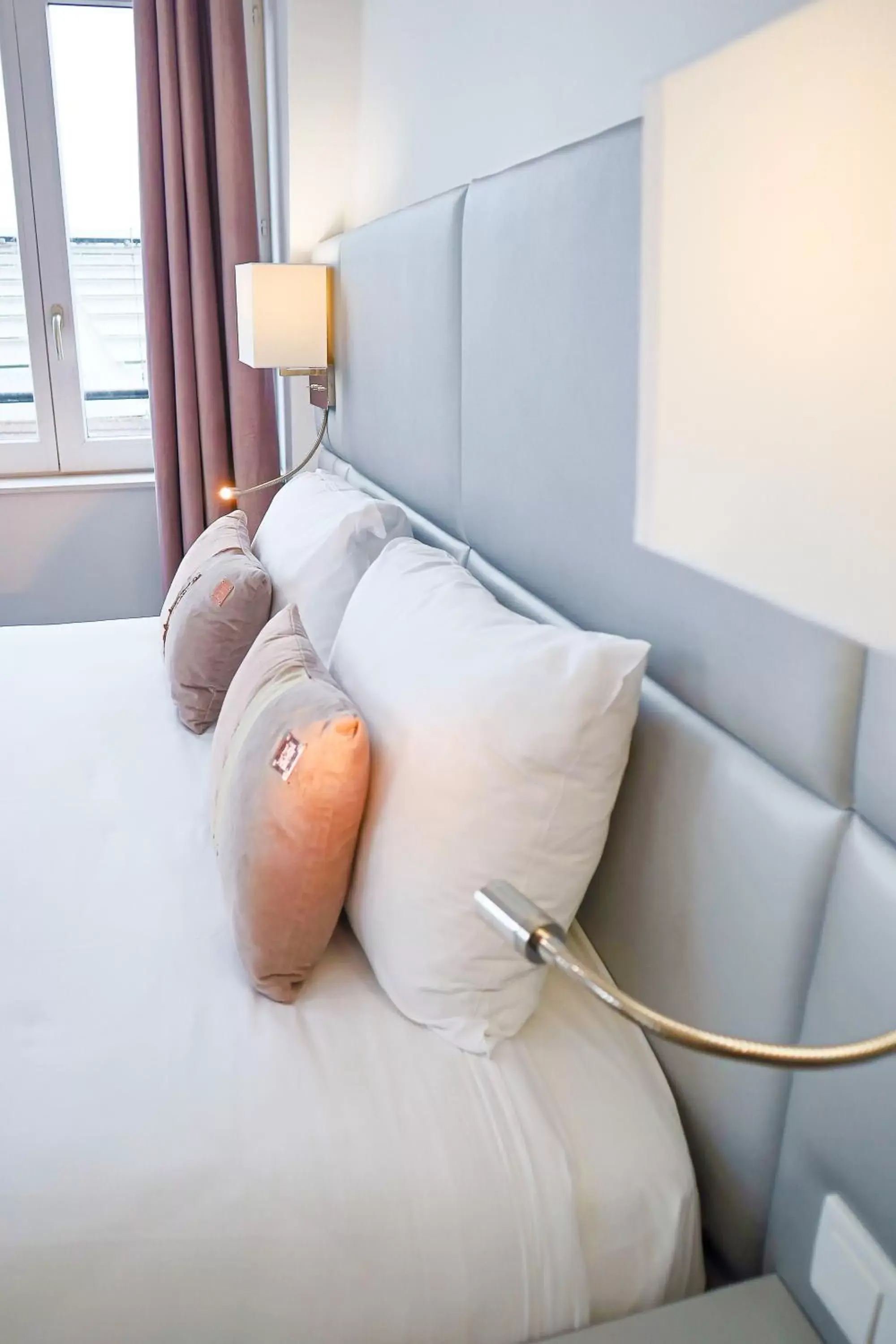 Bed in HOTEL AMBASSADEUR