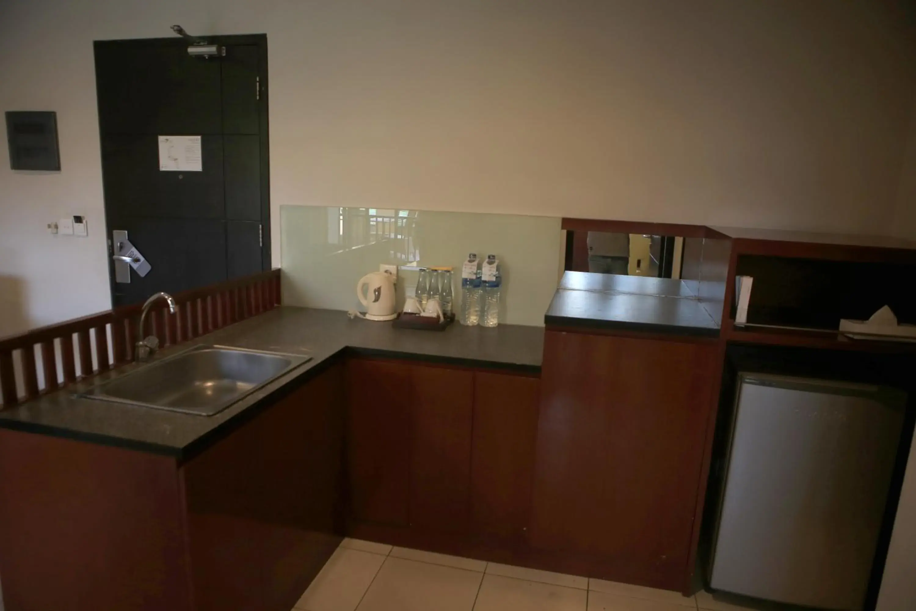 Property building, Kitchen/Kitchenette in Grand Kuta Hotel And Residence