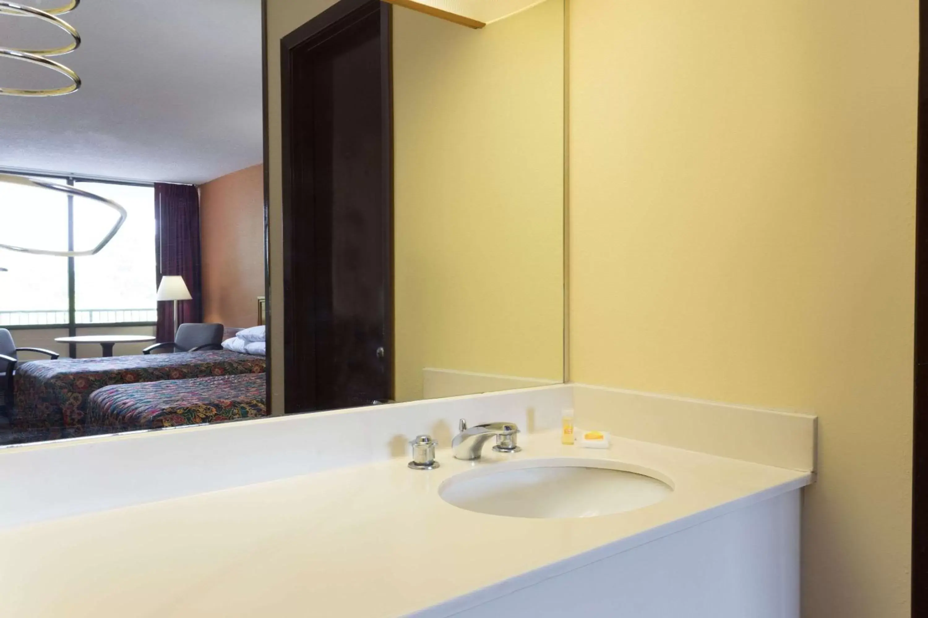 Bathroom in Days Inn by Wyndham Raleigh South