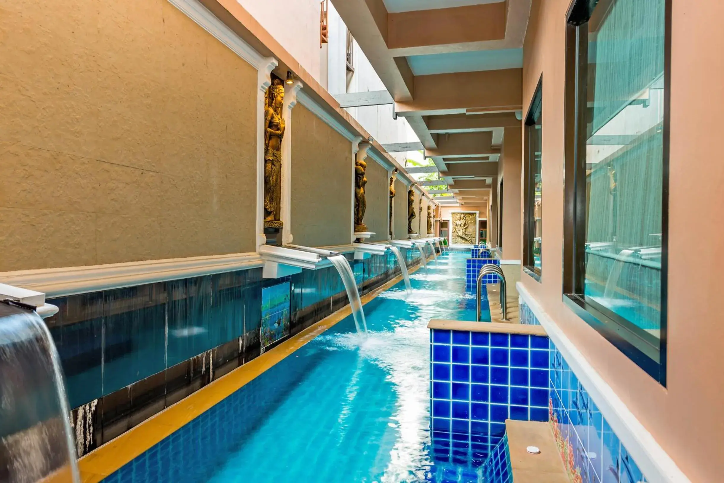 Swimming pool in Nipa Resort, Patong Beach Swimming pool in Nipa Resort, Patong Beach