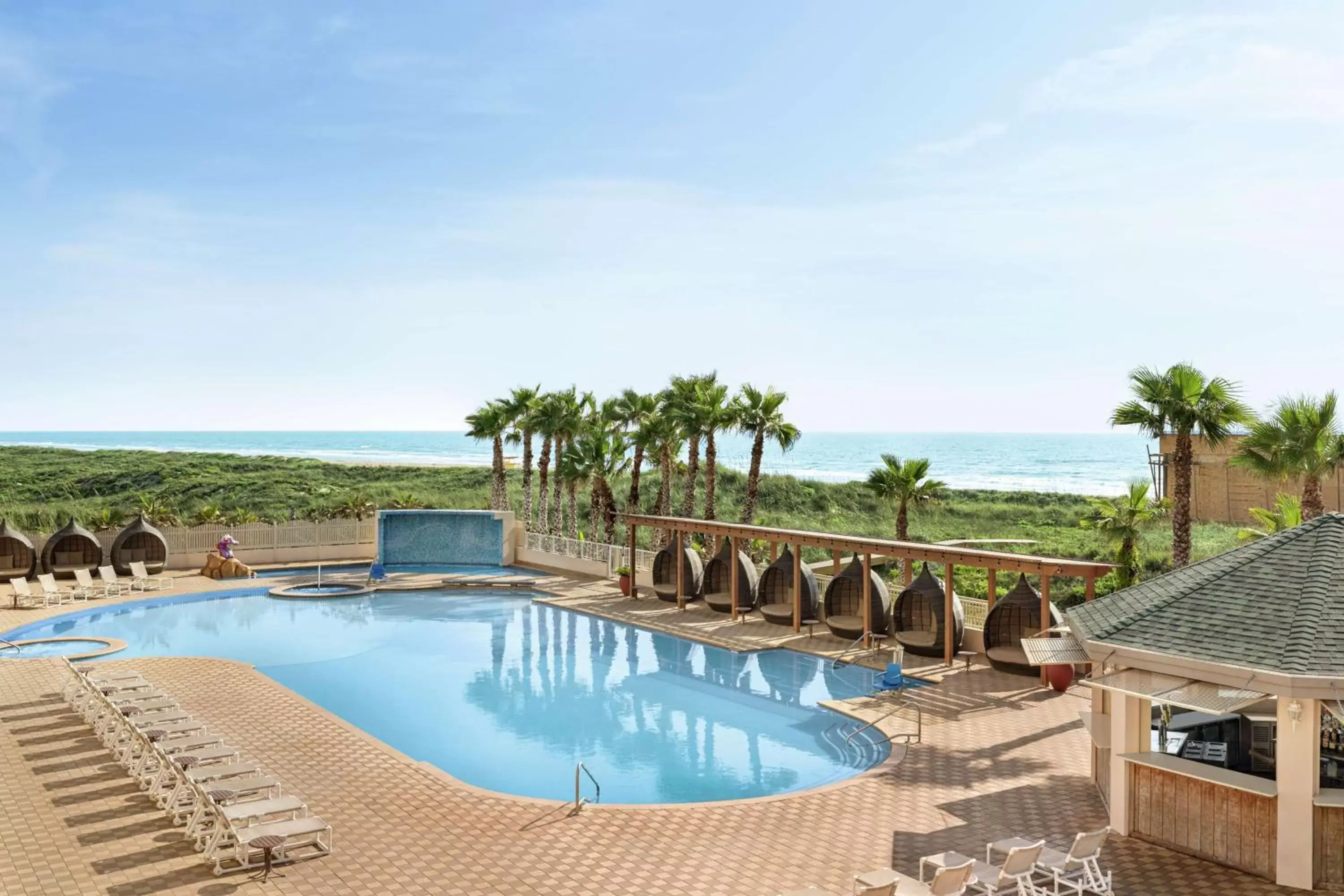 Pool view in Hilton Garden Inn South Padre Island Beachfront Pool view in Hilton Garden Inn South Padre Island Beachfront