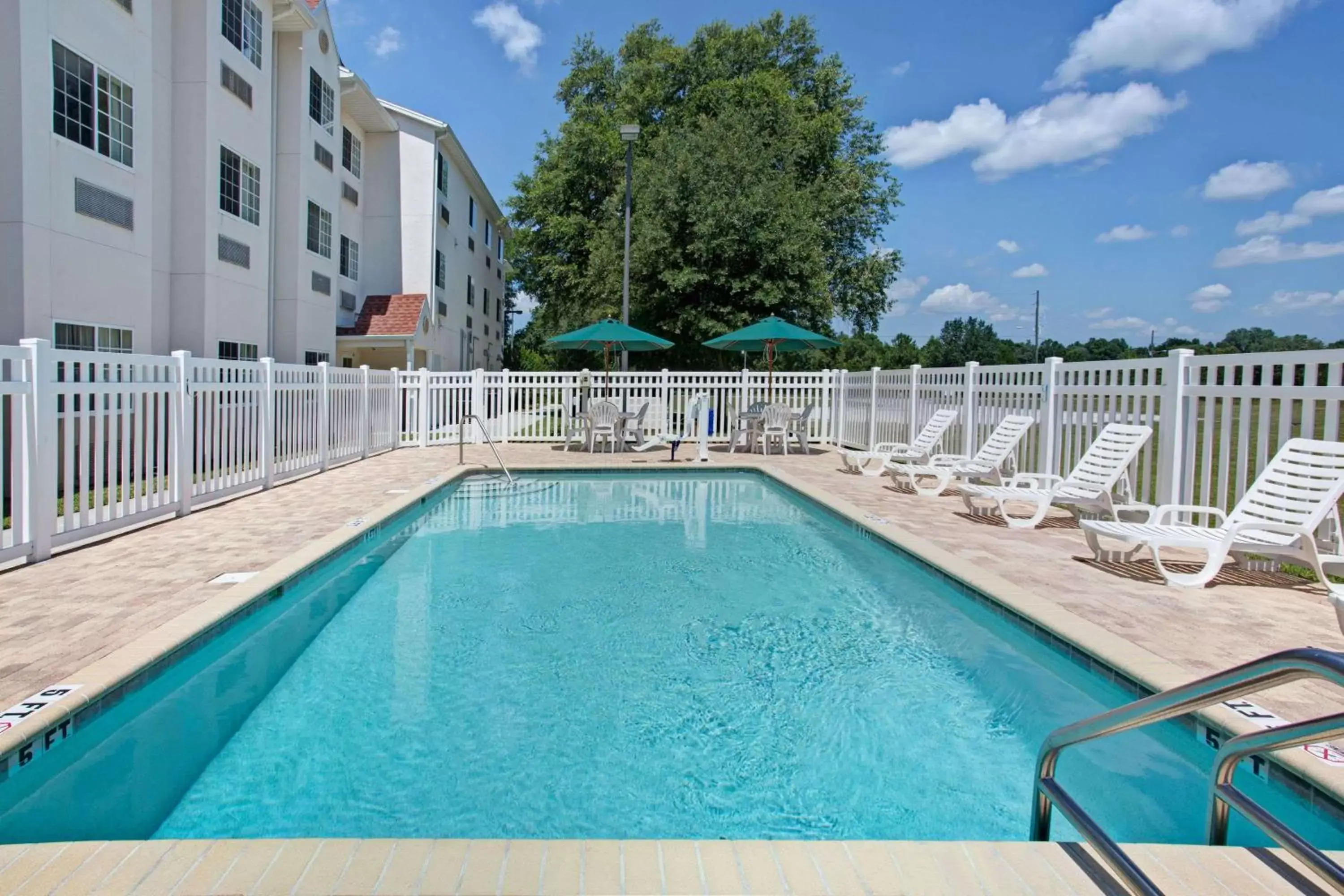 Queen Room with Two Queen Beds - Non-Smoking in Microtel Inn & Suites by Wyndham Brooksville