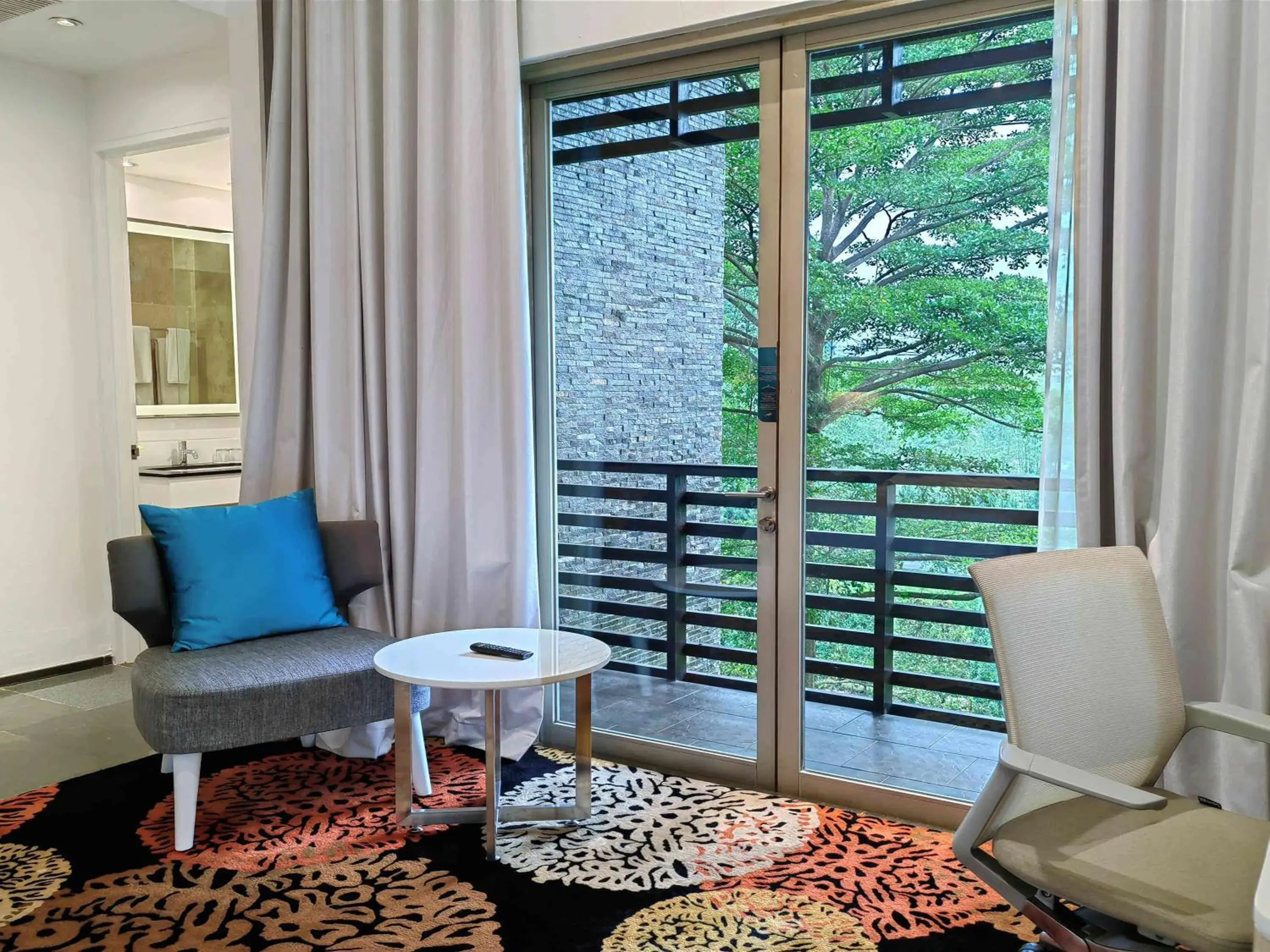 Bedroom, Seating Area in Novotel Palembang Hotel