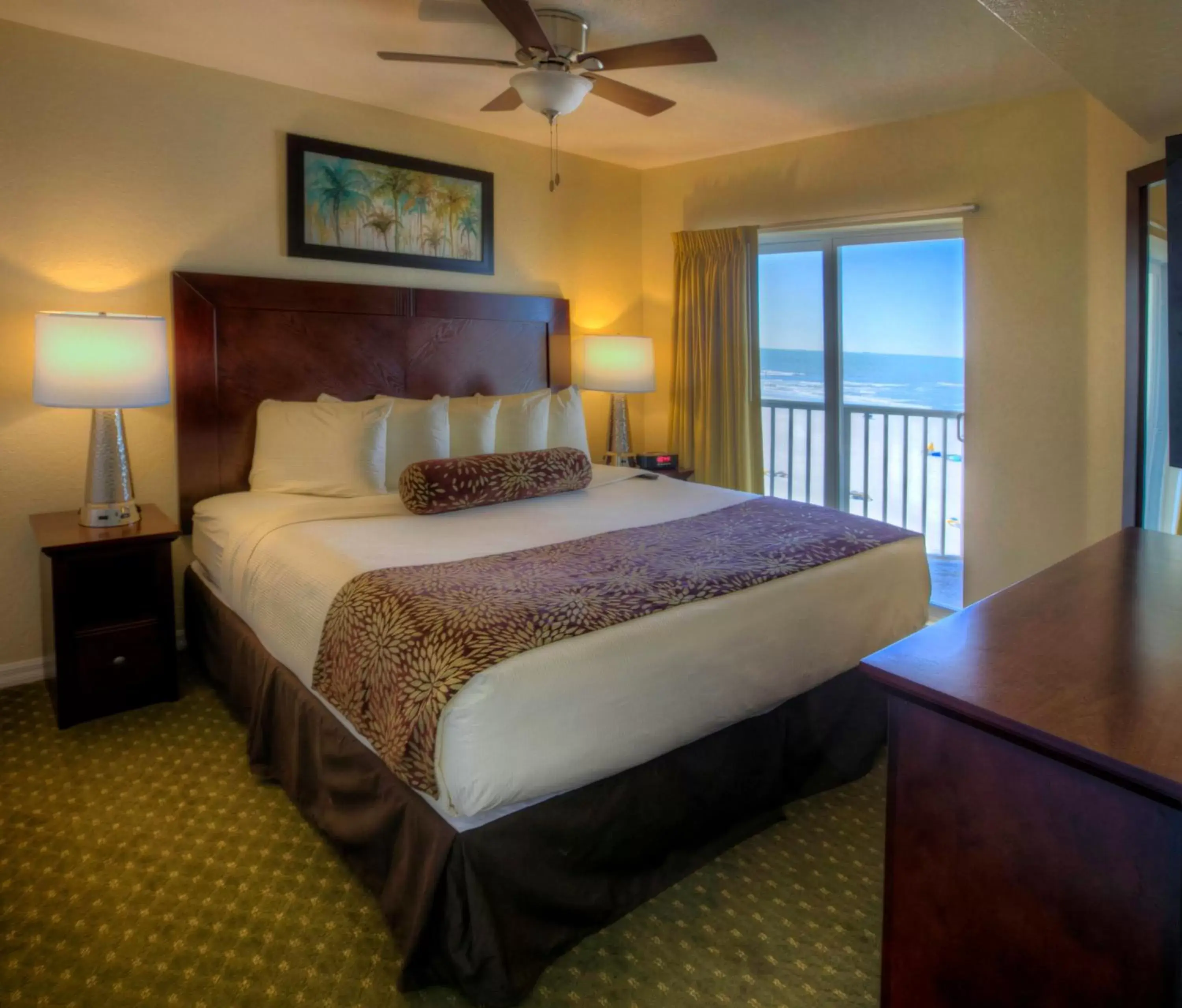 Bed in Sunset Vistas Two Bedroom Beachfront Suites