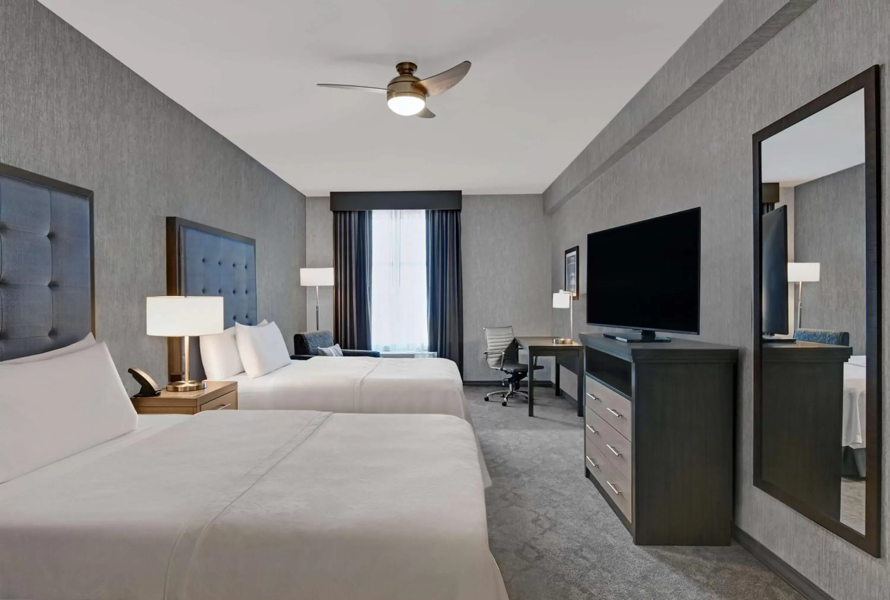 Bedroom, TV/Entertainment Center in Homewood Suites By Hilton Edison Woodbridge, NJ