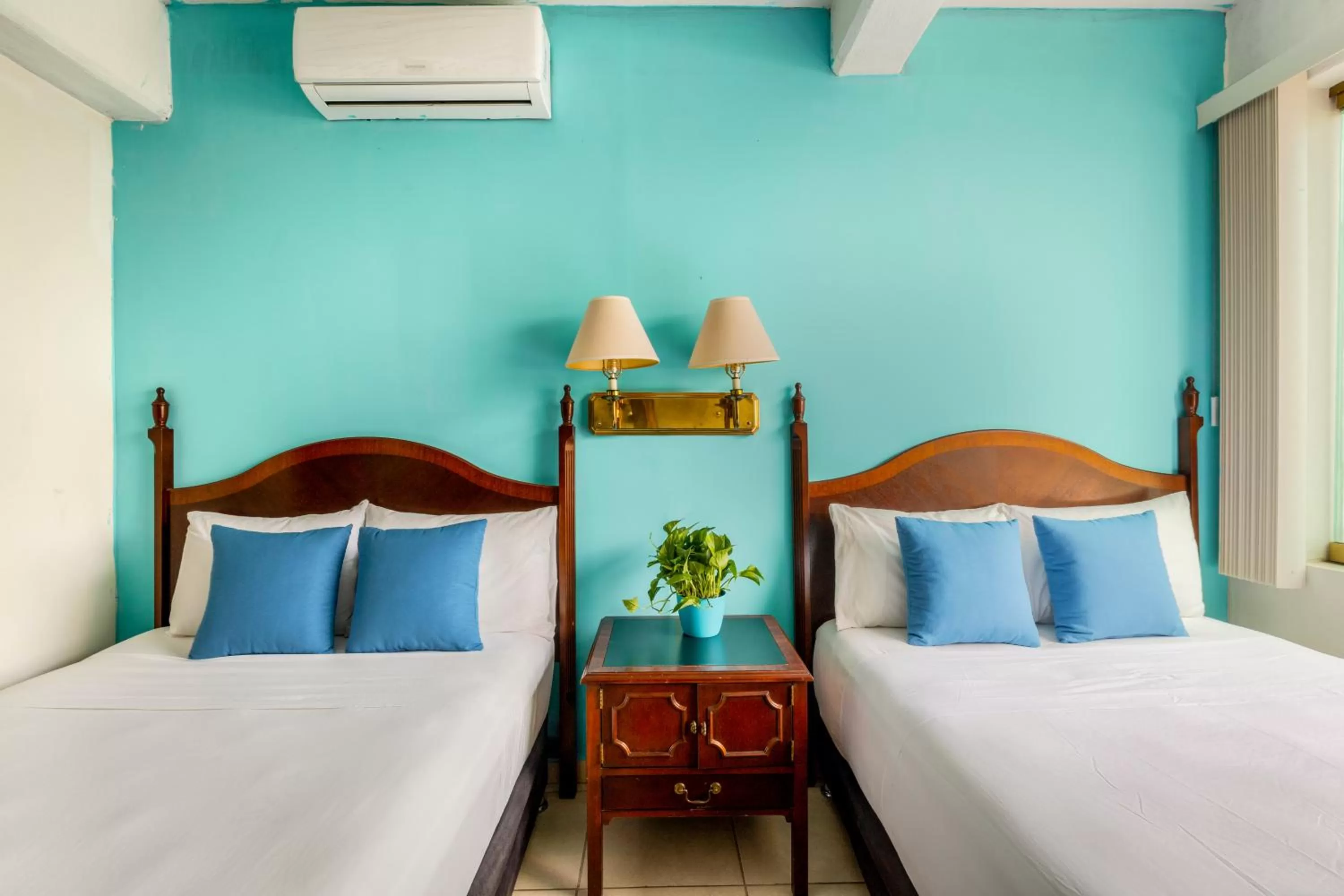 Bed in Hotel Pueblito Vallarta