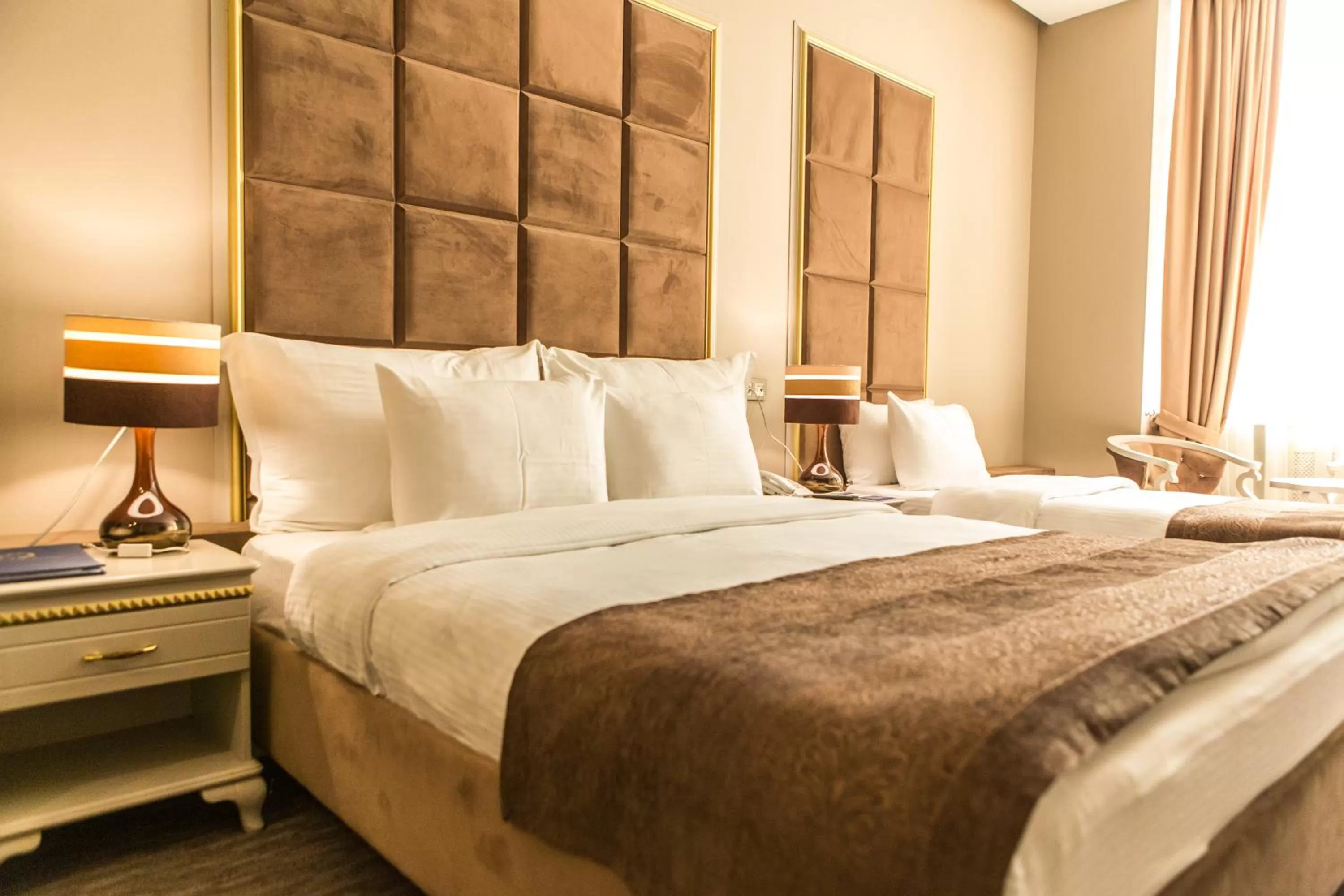 Bedroom, Bed in Grand Sapphire Hotel