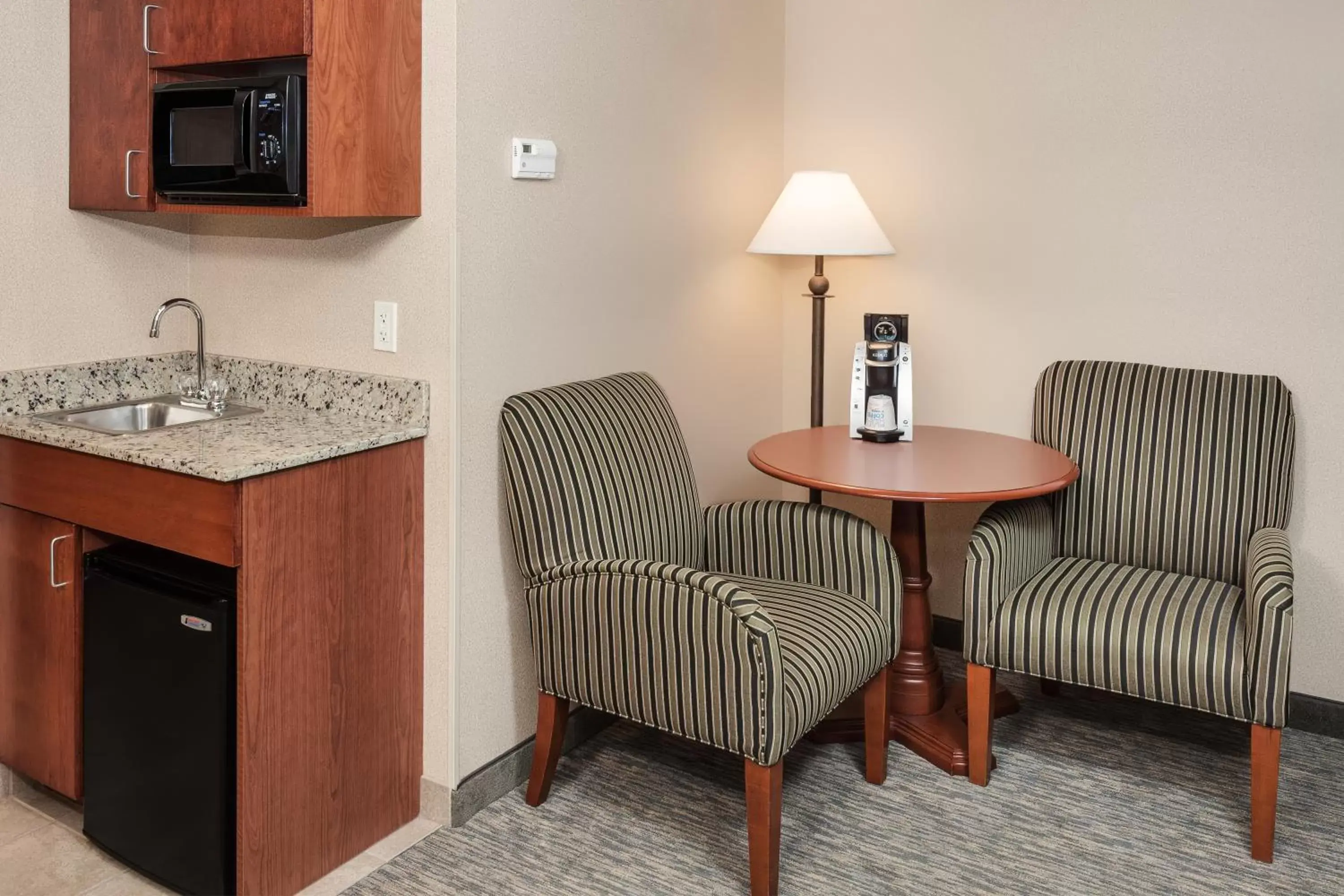 Seating Area in Holiday Inn Express Hotel & Suites Hampton South-Seabrook, an IHG Hotel