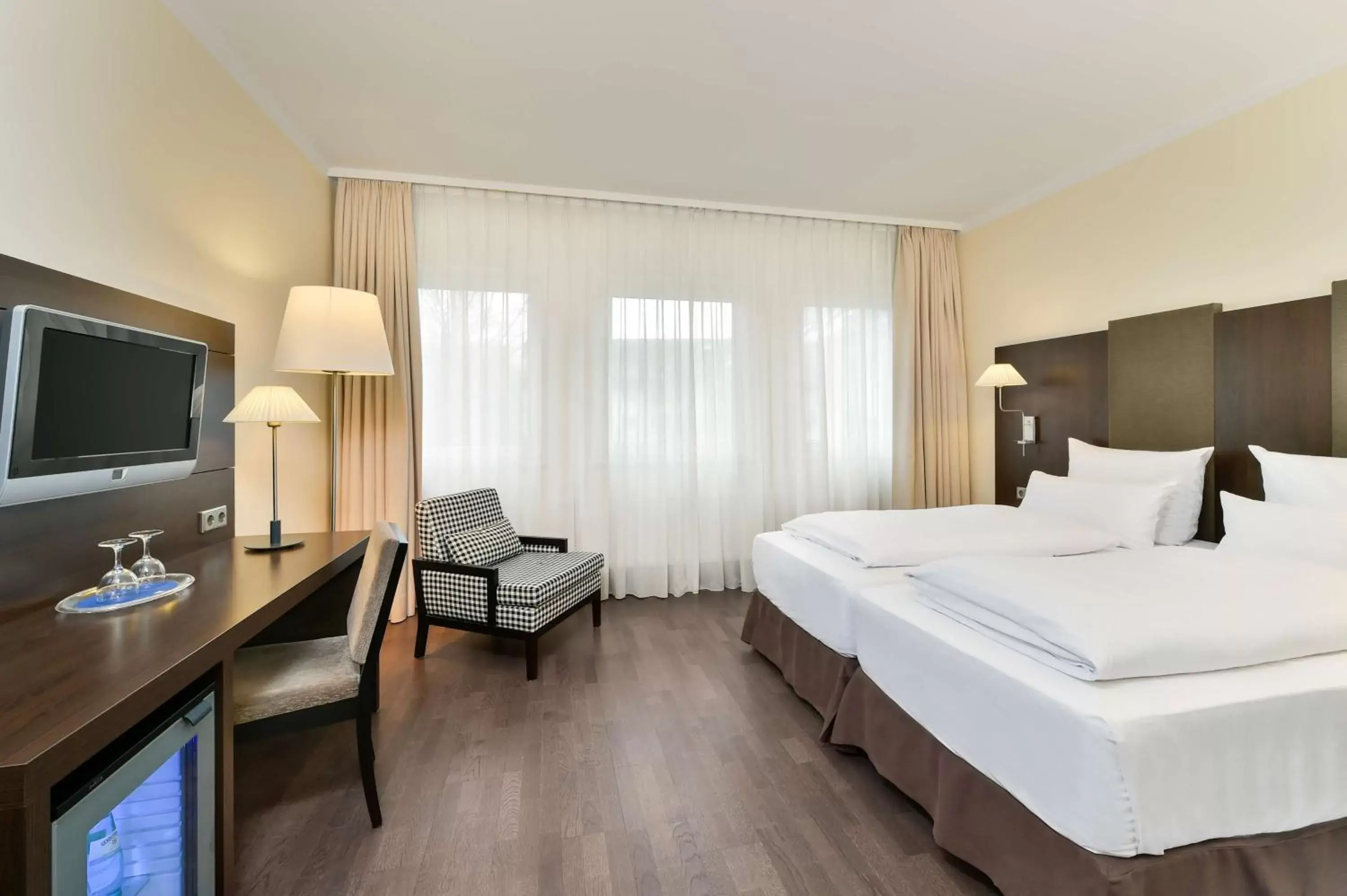 Photo of the whole room, TV/Entertainment Center in NH München City Süd Photo of the whole room, TV/Entertainment Center in NH München City Süd