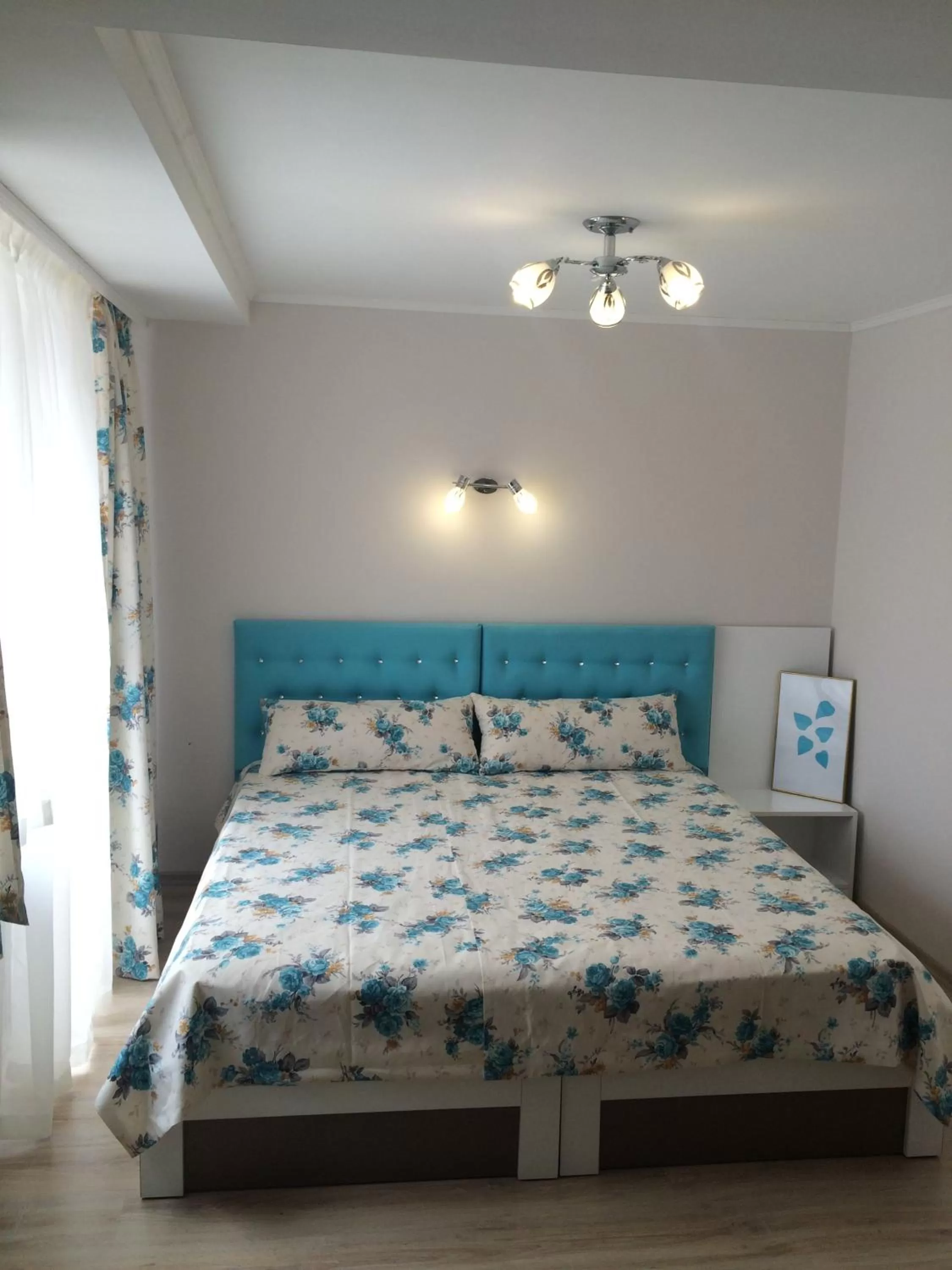 Bed in White Rose Guest Rooms