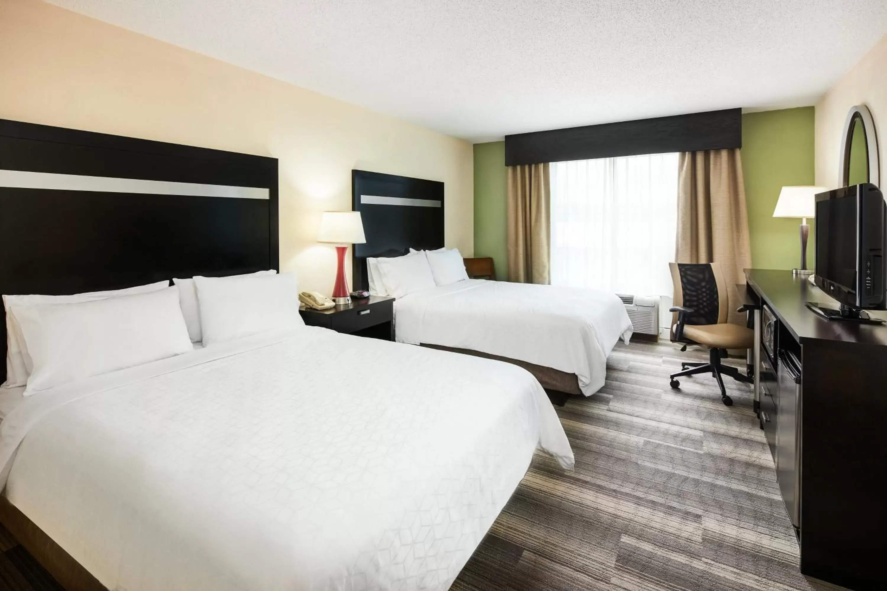 Photo of the whole room, Bed in Holiday Inn Express & Suites I-26 & Us 29 At Westgate Mall, an IHG Hotel