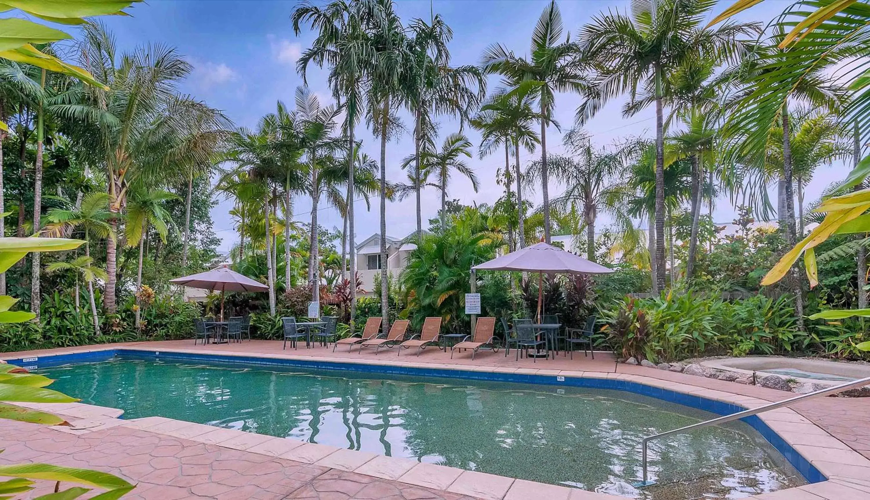 Garden, Swimming Pool in The Villas Palm Cove