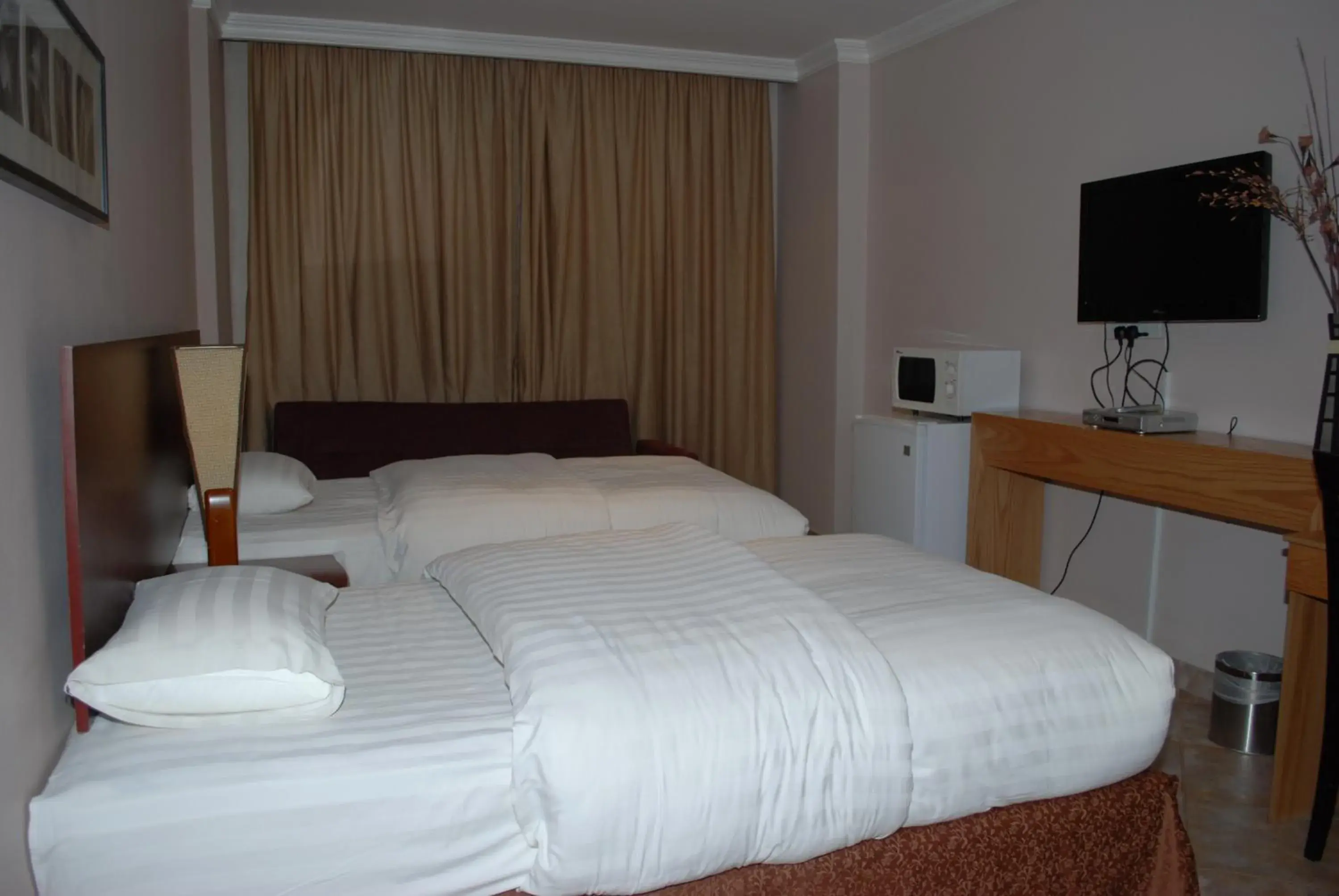 Bedroom, Bed in Times Square Suite Hotel