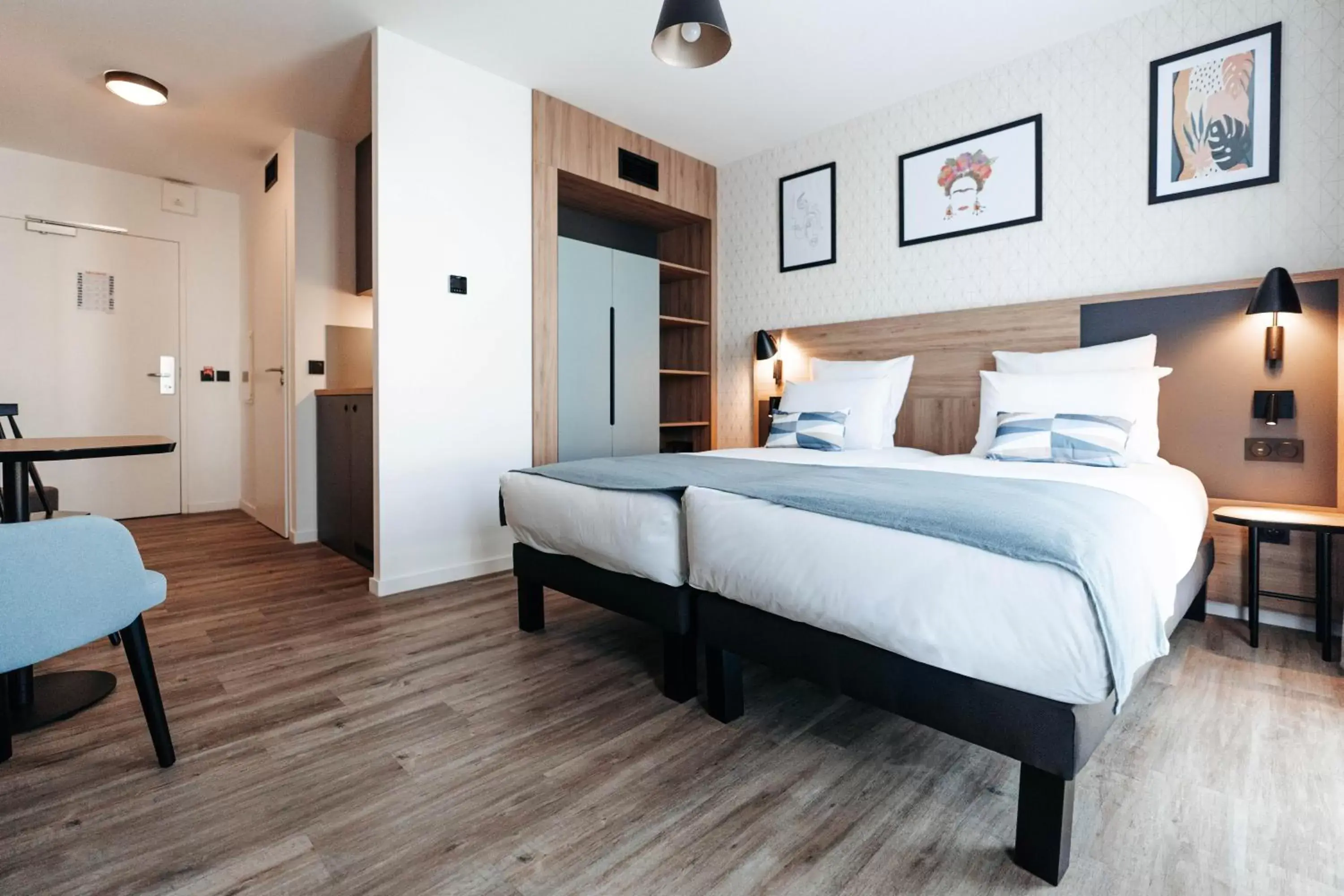 Photo of the whole room, Bed in Appart'City Collection Saint Germain en Laye Photo of the whole room, Bed in Appart'City Collection Saint Germain en Laye