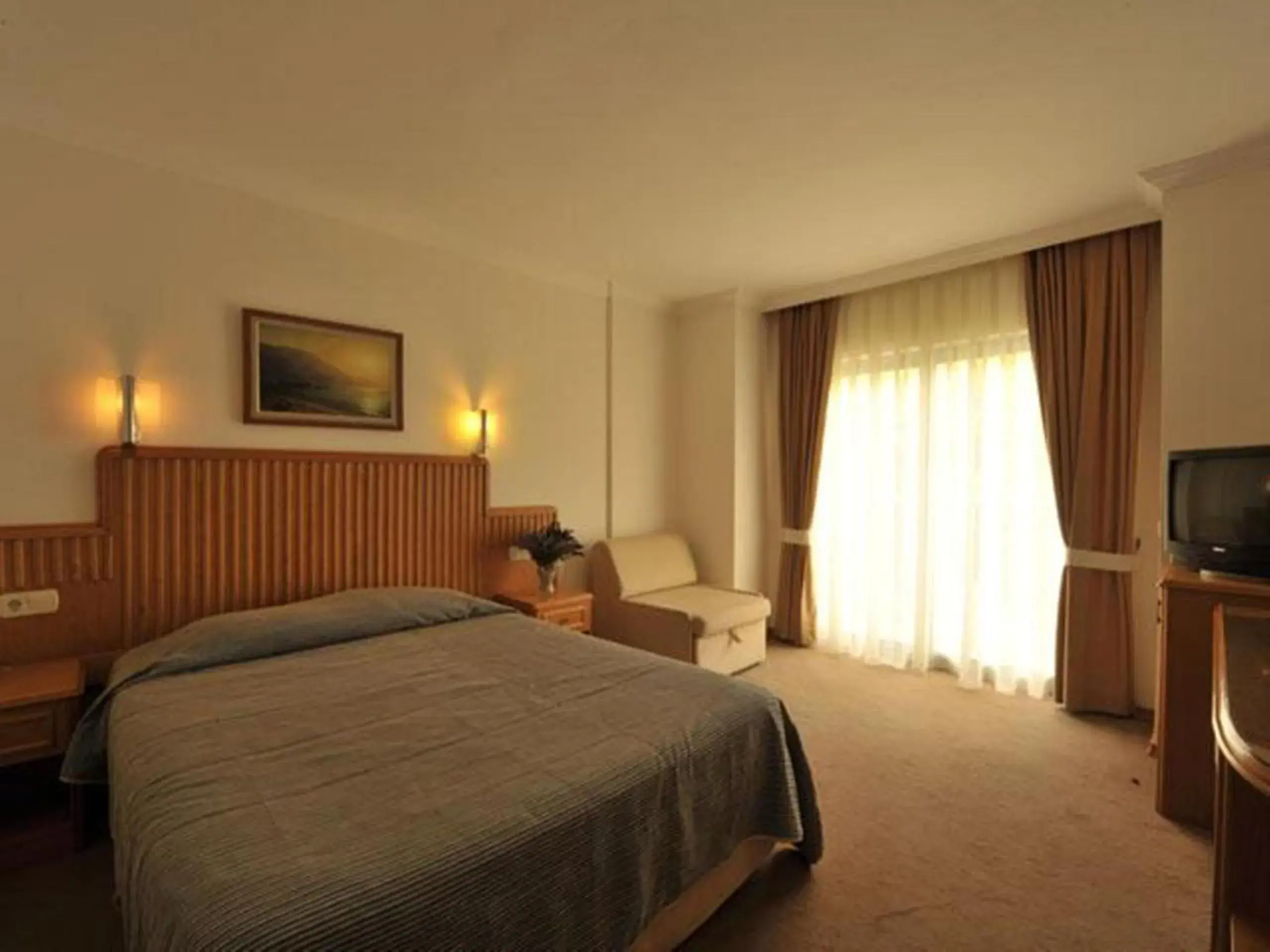 Photo of the whole room, Bed in Belcehan Deluxe Hotel