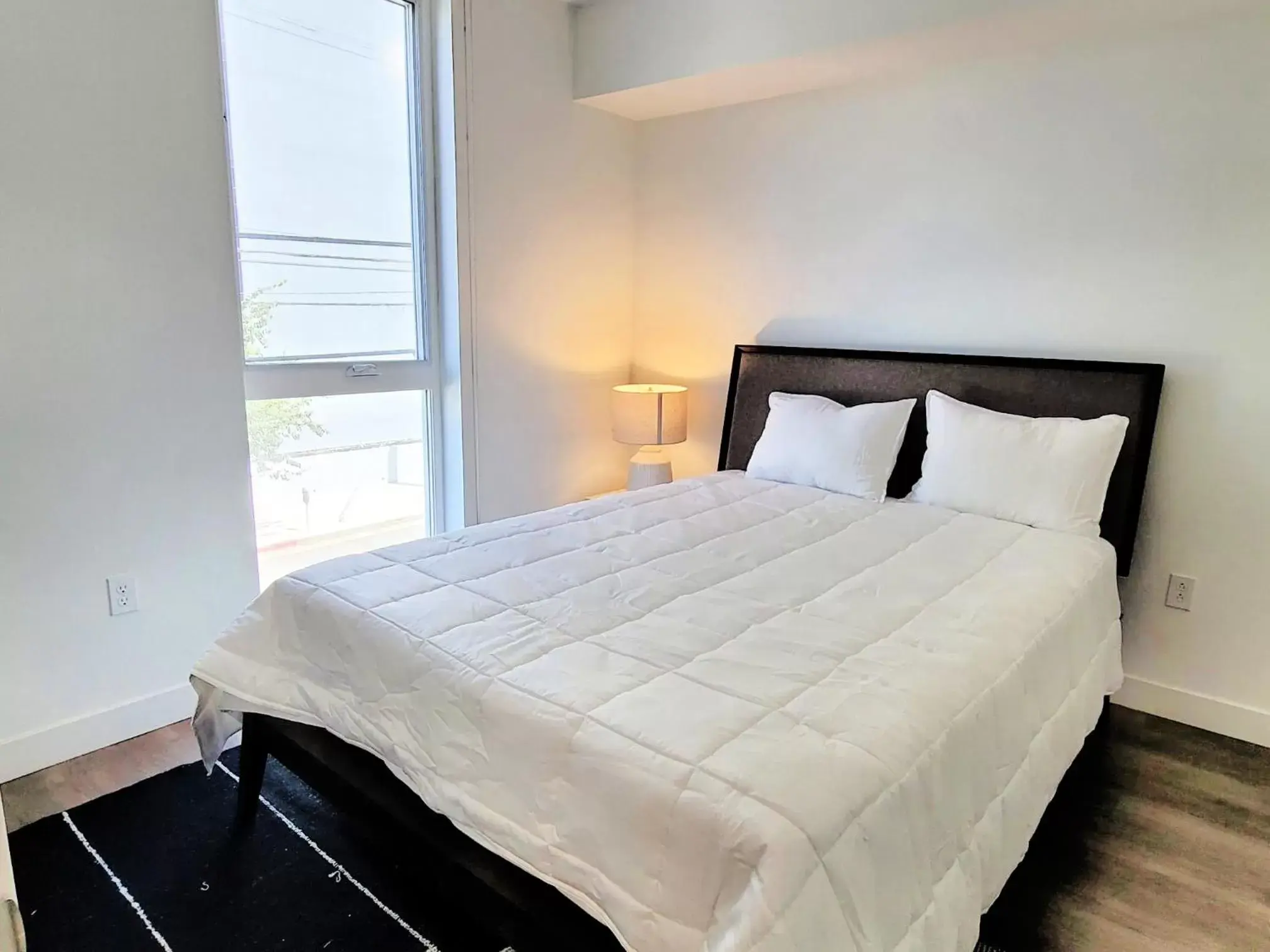 Bed in Gorgeous Hollywood Apts LA's Best Location and Amazing Roof Deck