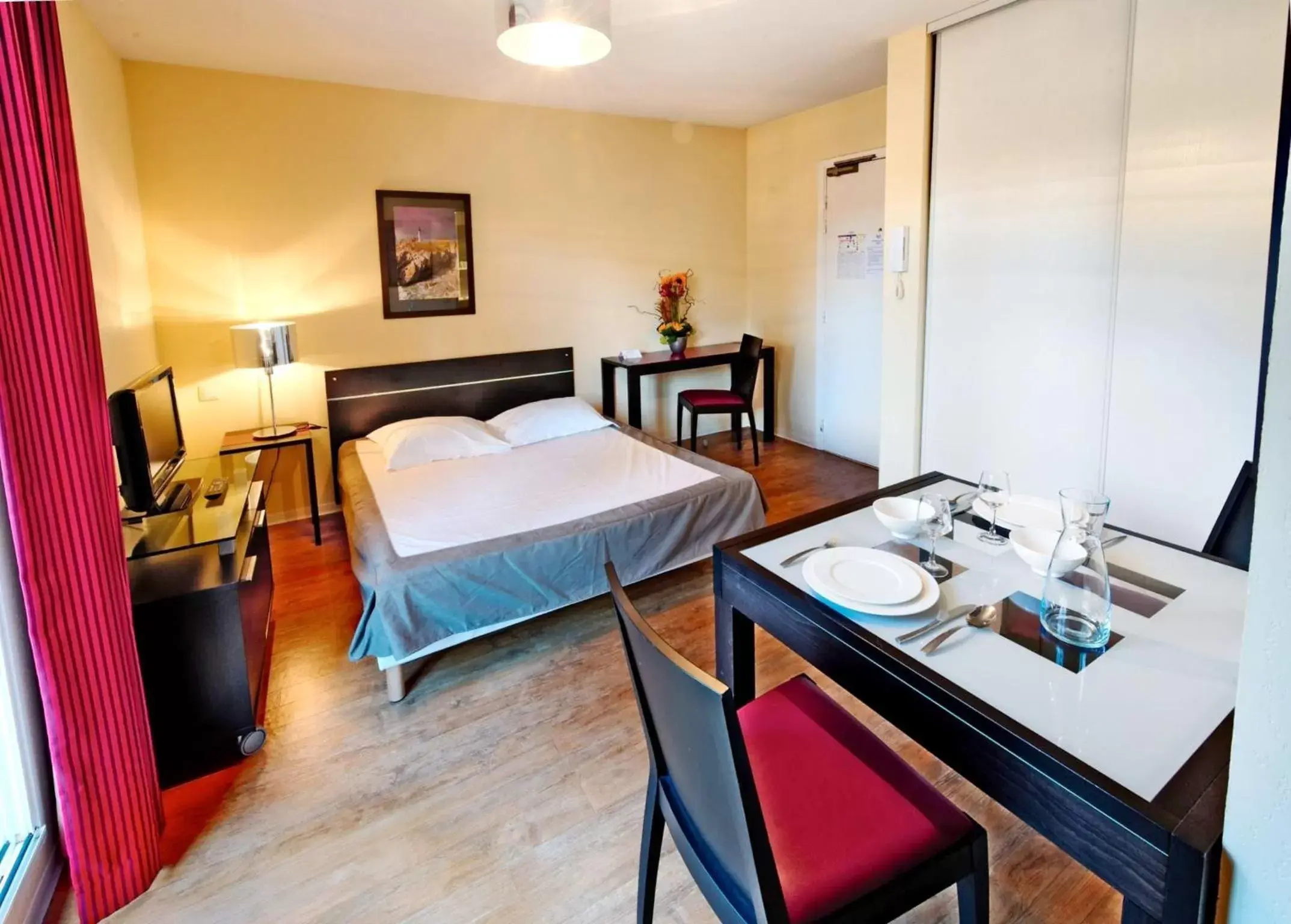 Bedroom, Bed in Appart Hotel Odalys City Antibes Olympe Bedroom, Bed in Appart Hotel Odalys City Antibes Olympe