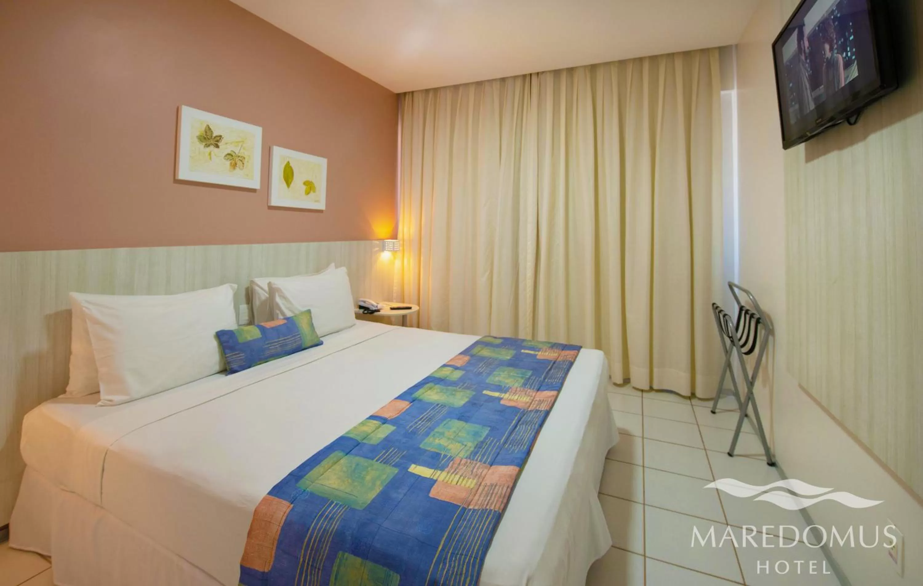 Bed in Maredomus Hotel