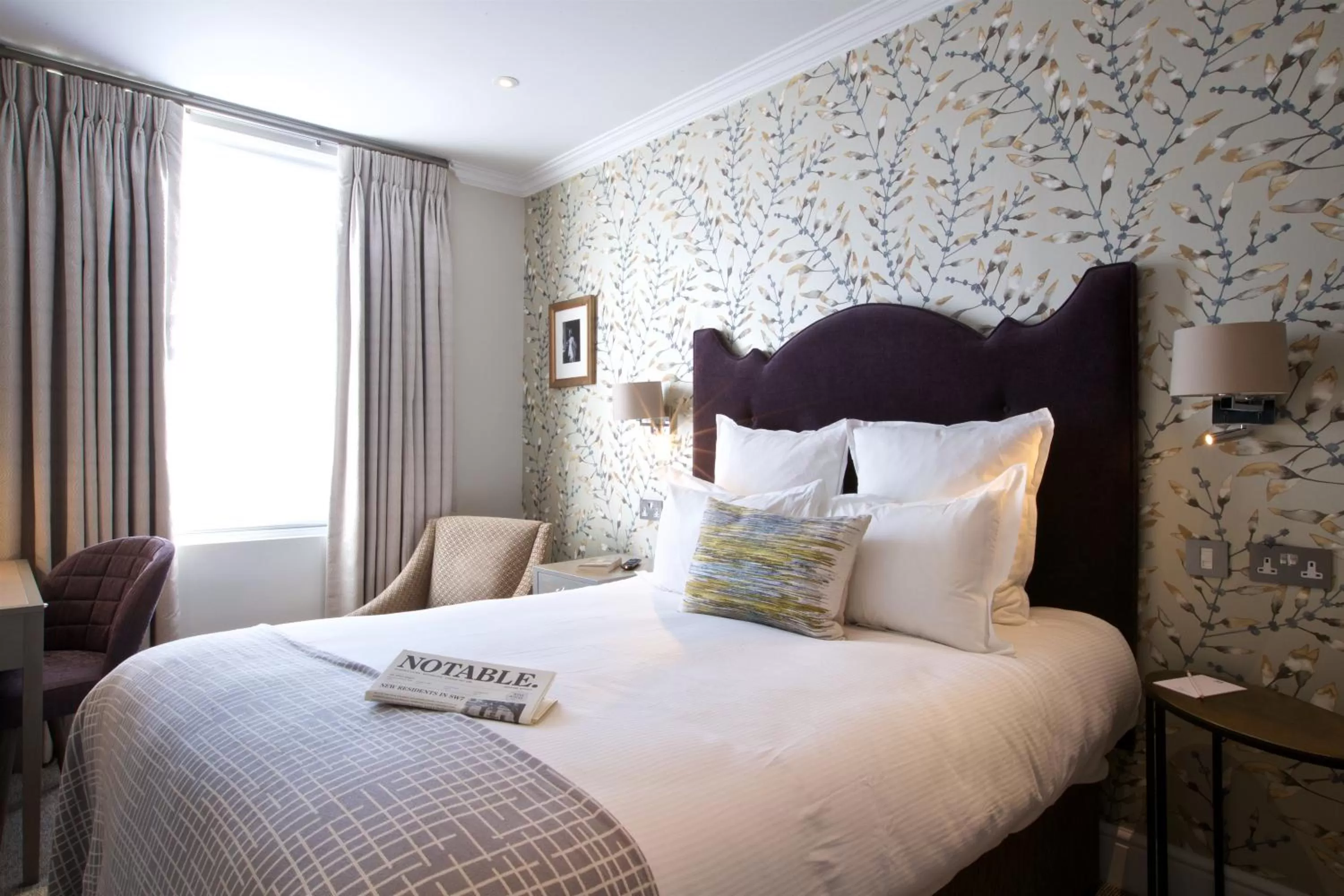 Bed in 54 Queen's Gate Hotel