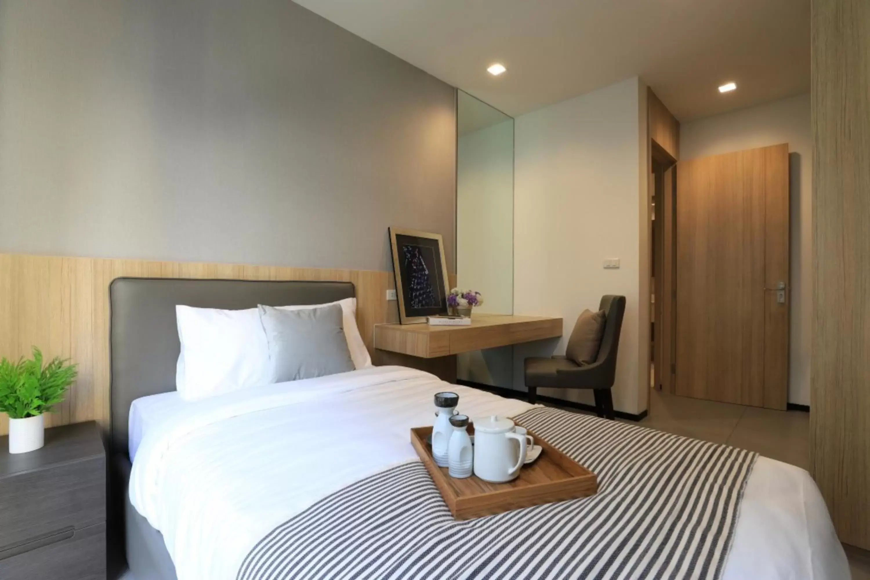 Bed in Alix Bangkok Hotel