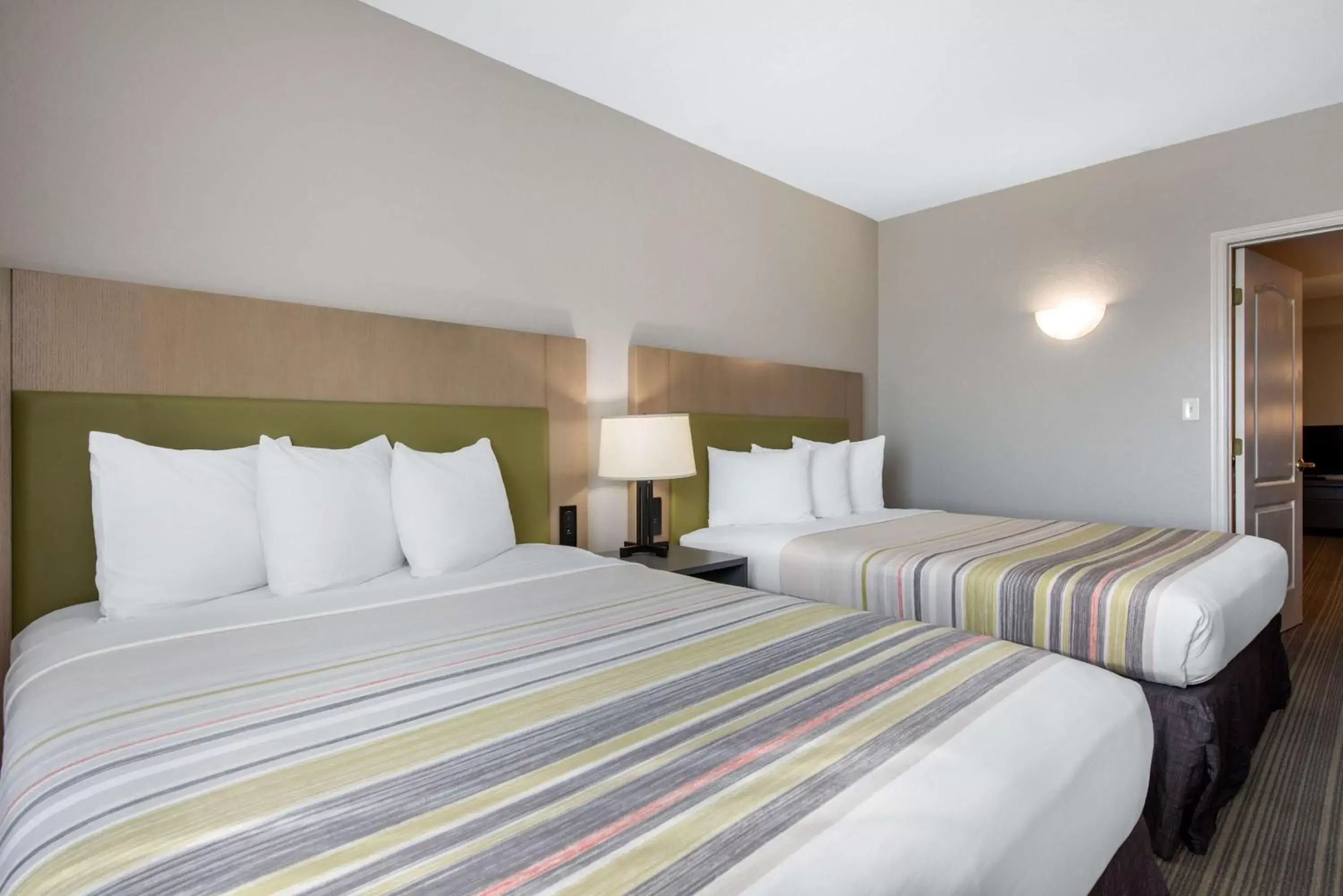 Photo of the whole room, Bed in Country Inn & Suites by Radisson, Port Canaveral, FL