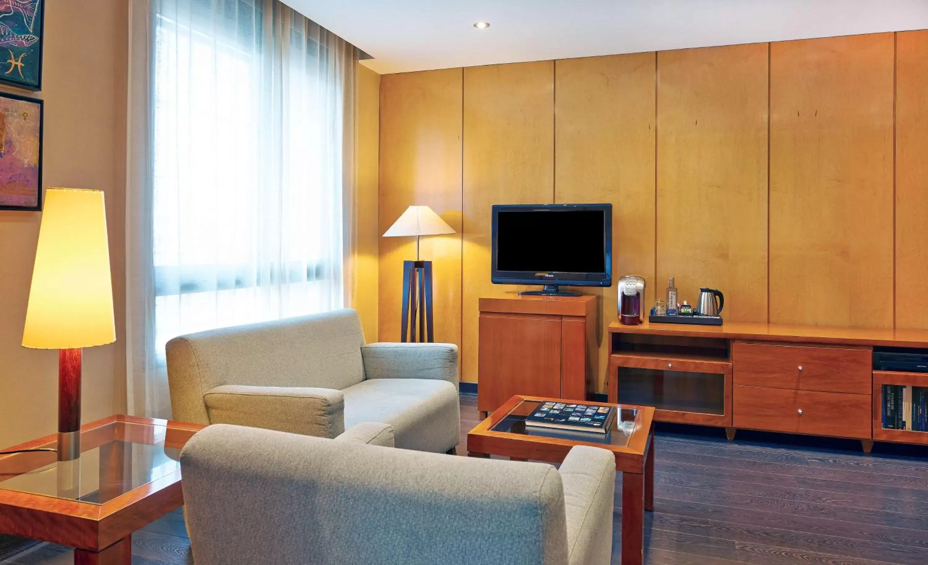 Photo of the whole room, TV/Entertainment Center in NH Lleida Pirineos