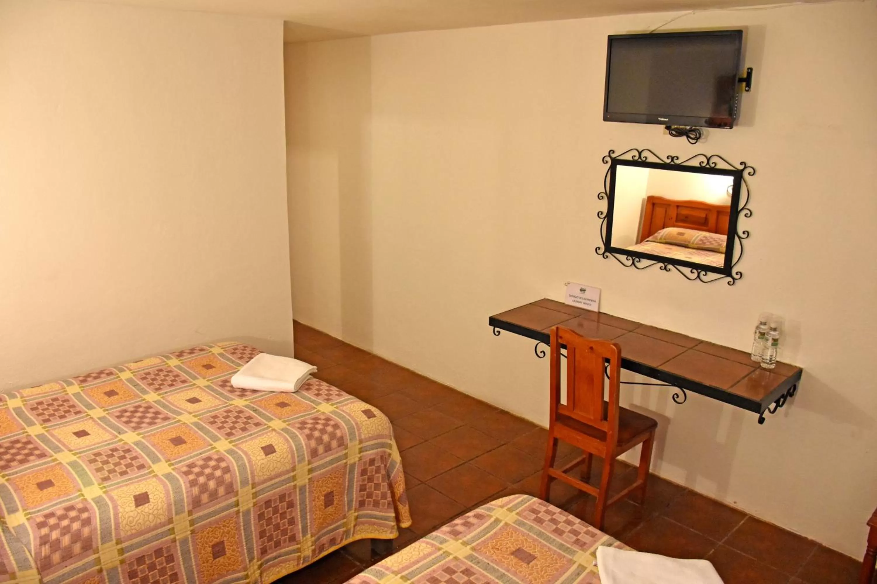 Bed in Hotel San Luis