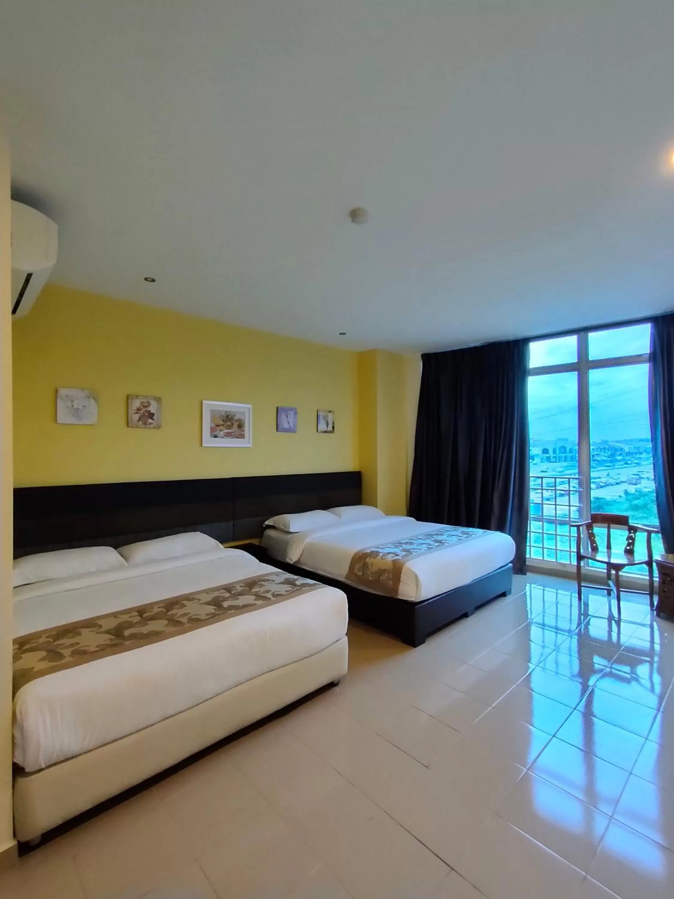 Photo of the whole room, Bed in TIONG HUA HOTEL