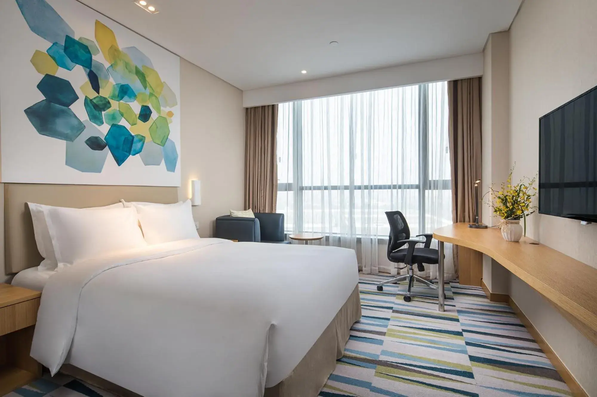 Bed in Holiday Inn Express Suzhou Taihu Lake, an IHG Hotel