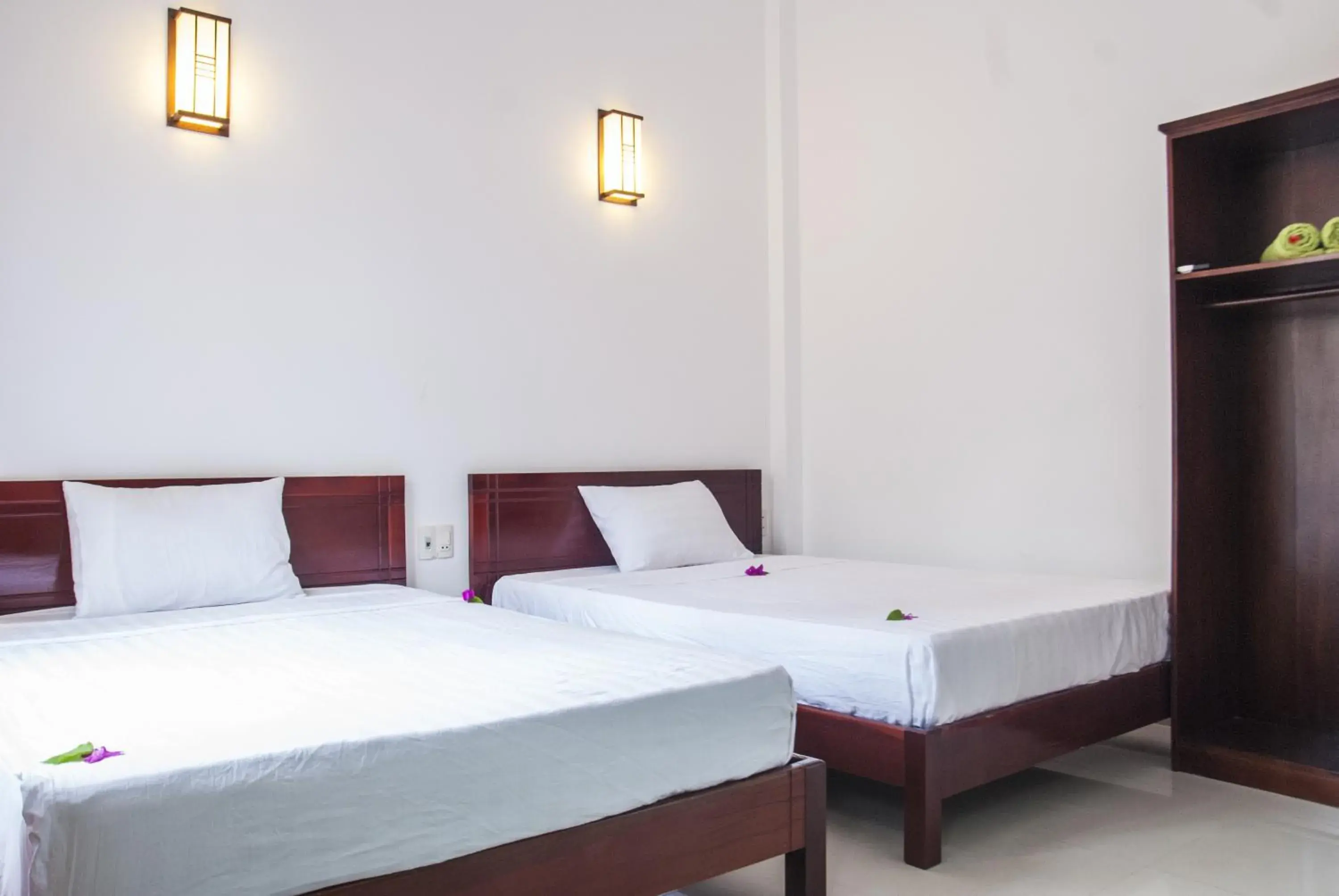 Bed in Mango Garden Hoi An Homestay