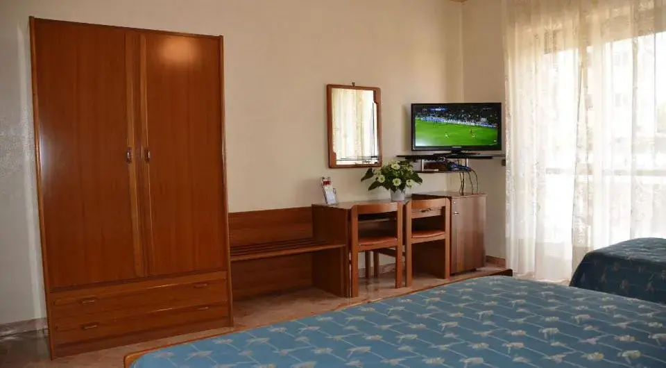 Bedroom, TV/Entertainment Center in Hotel A-14