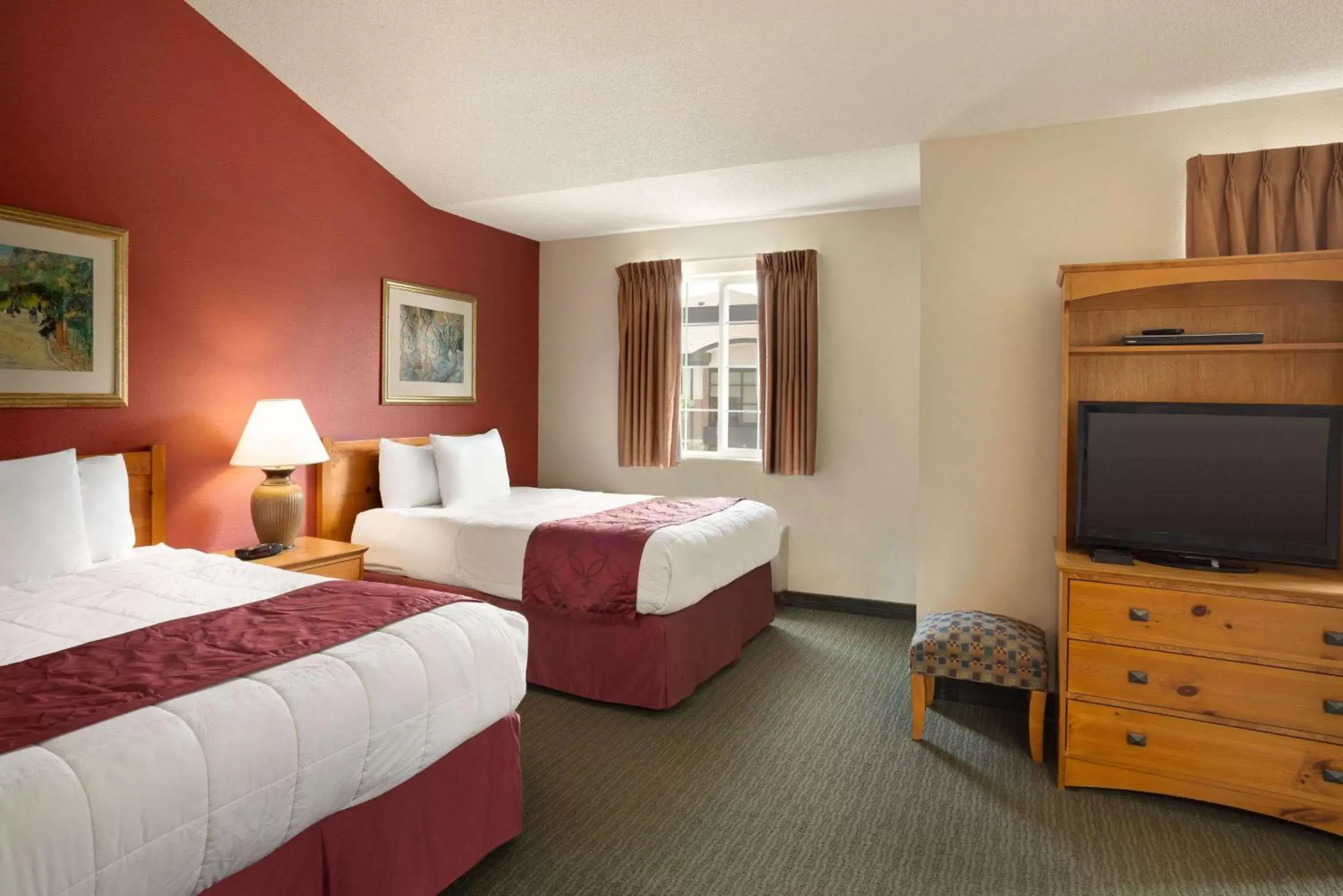 Photo of the whole room, Bed in Baymont by Wyndham Wichita East