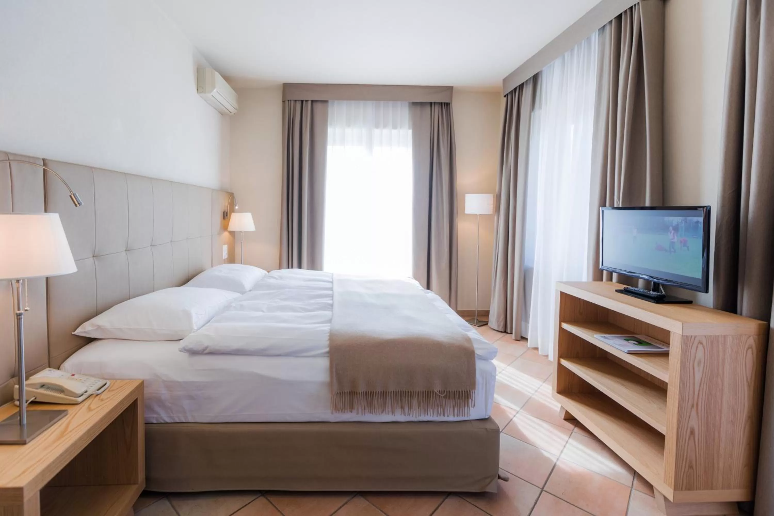 Bedroom, Bed in Parkhotel Delta, Wellbeing Resort