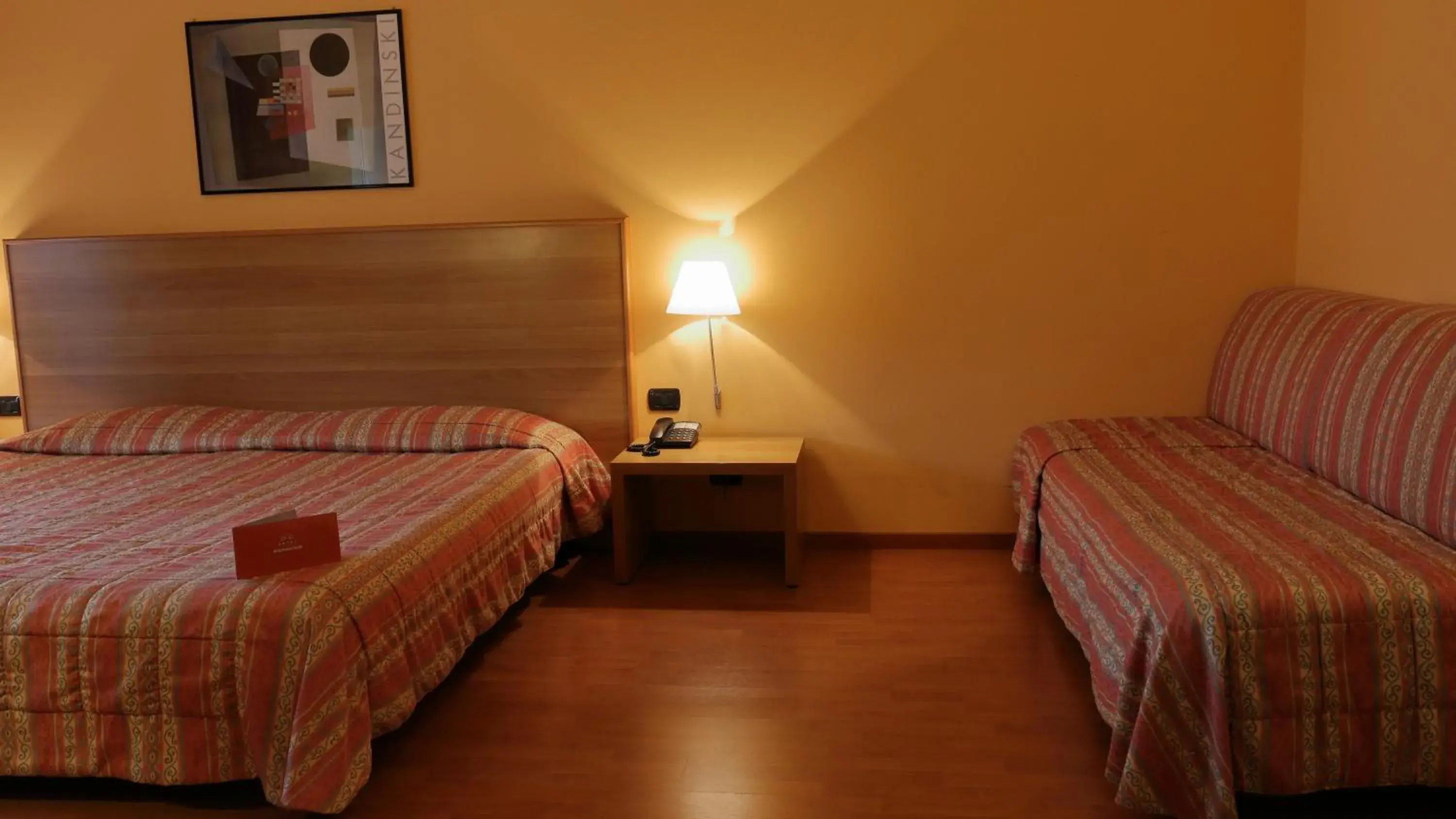 Bed in Hotel Romanisio