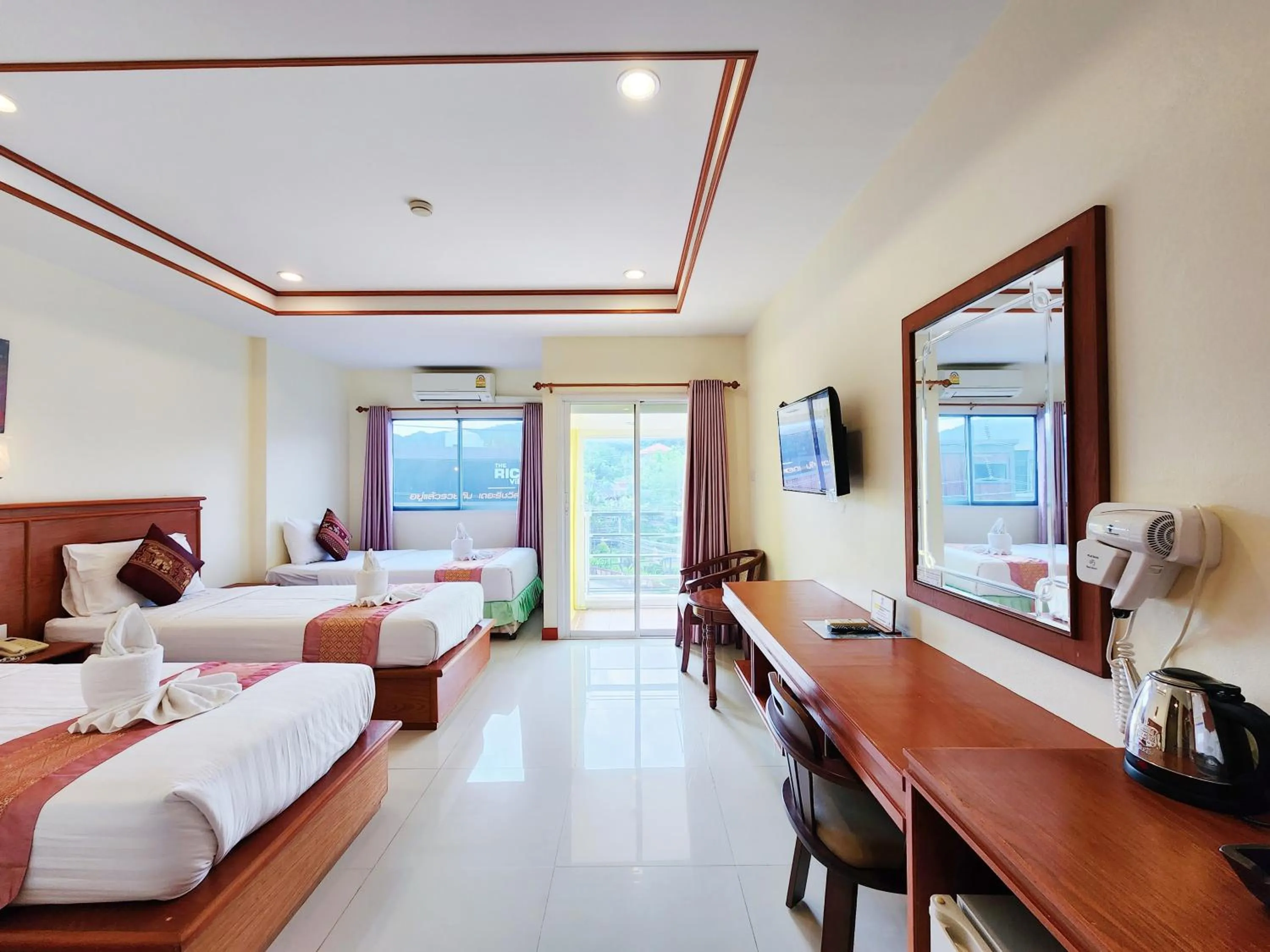 Bed in Phaithong Sotel Resort