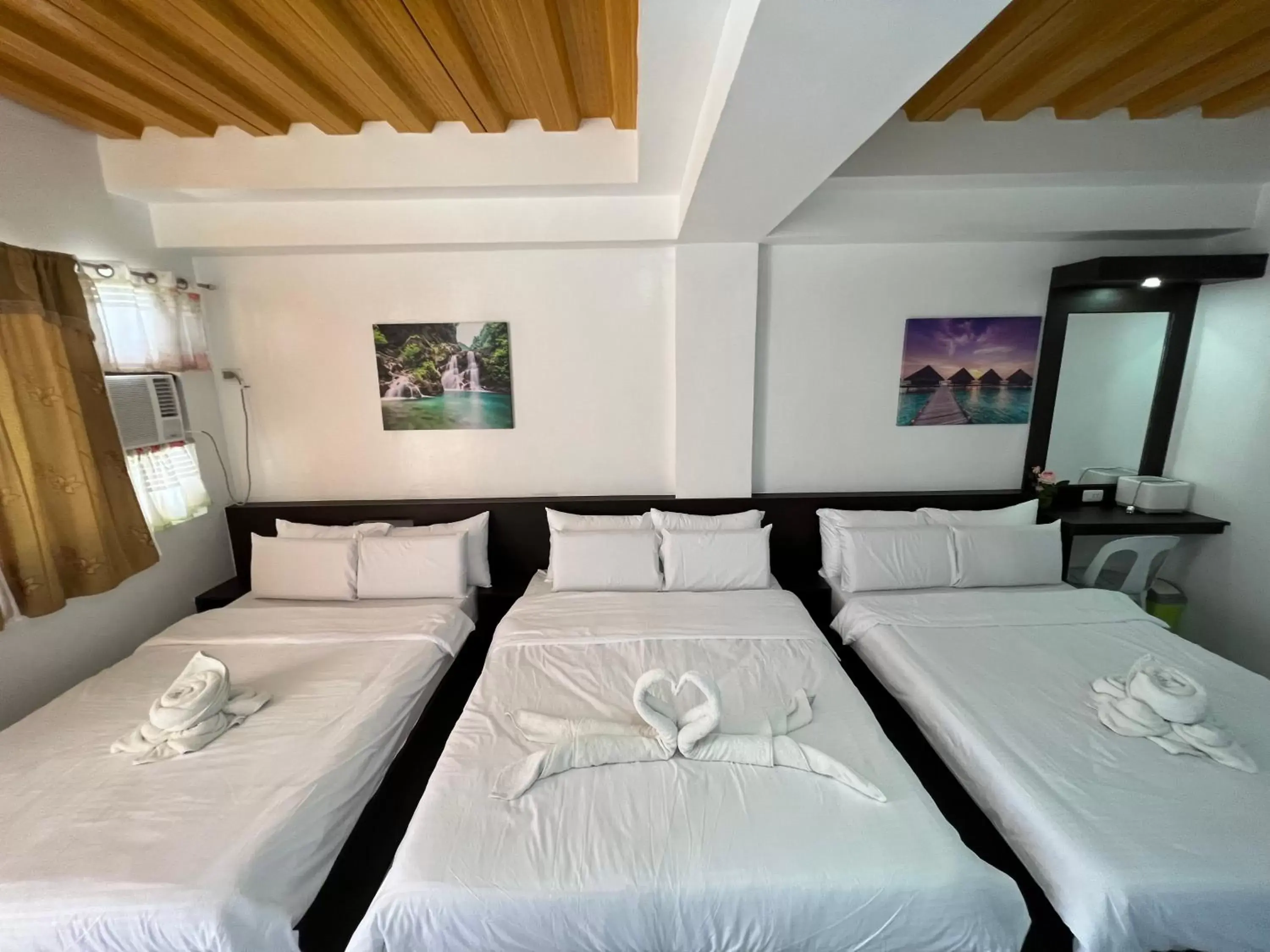 Bed in GingGing Hotel And Resort