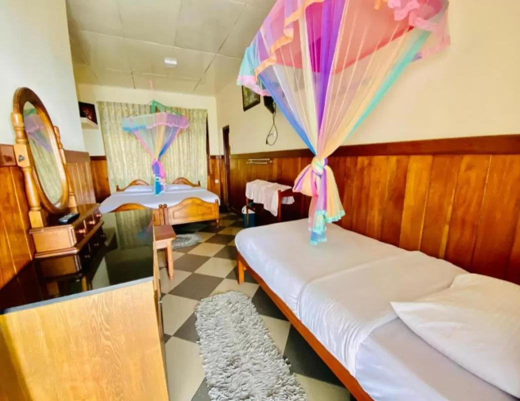 Photo of the whole room, Bed in Srilak View Holiday Inn