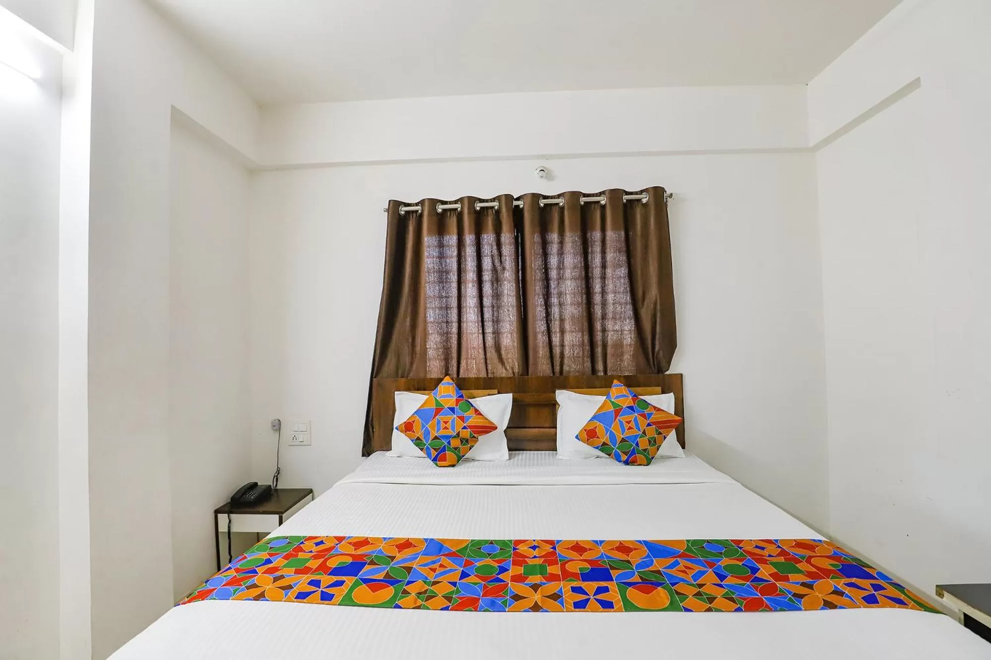 Bed in FabHotel Elite Palm