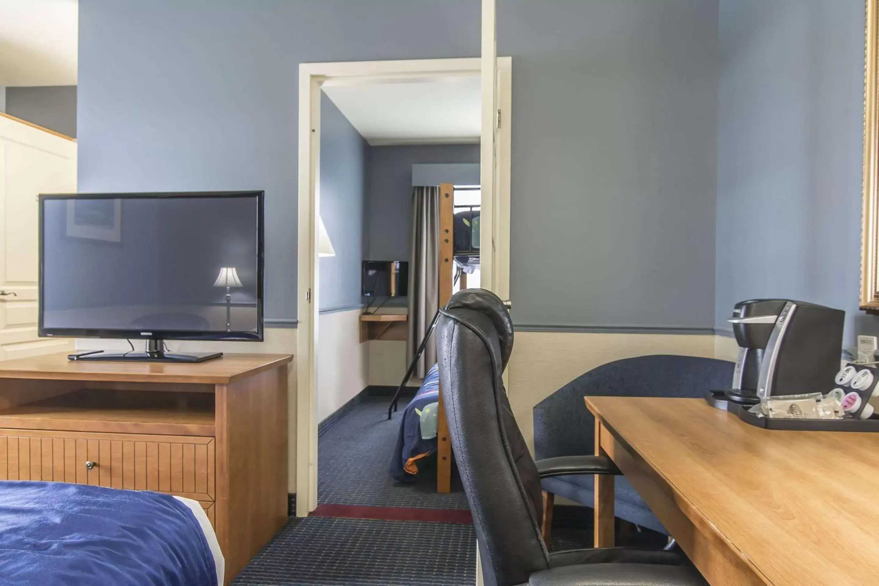 Photo of the whole room, TV/Entertainment Center in Quality Inn Riviere-Du-Loup