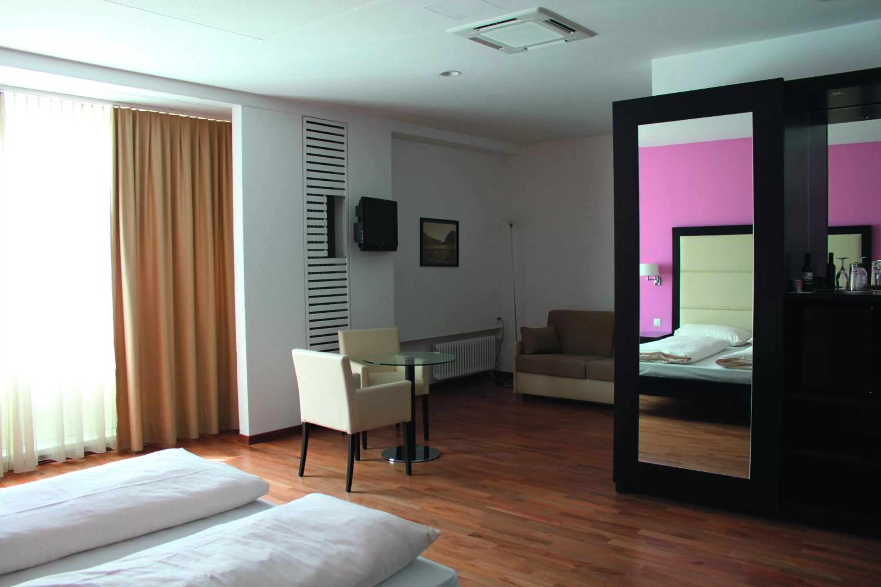 Bed in Enjoy 1313AG Hotel Touring