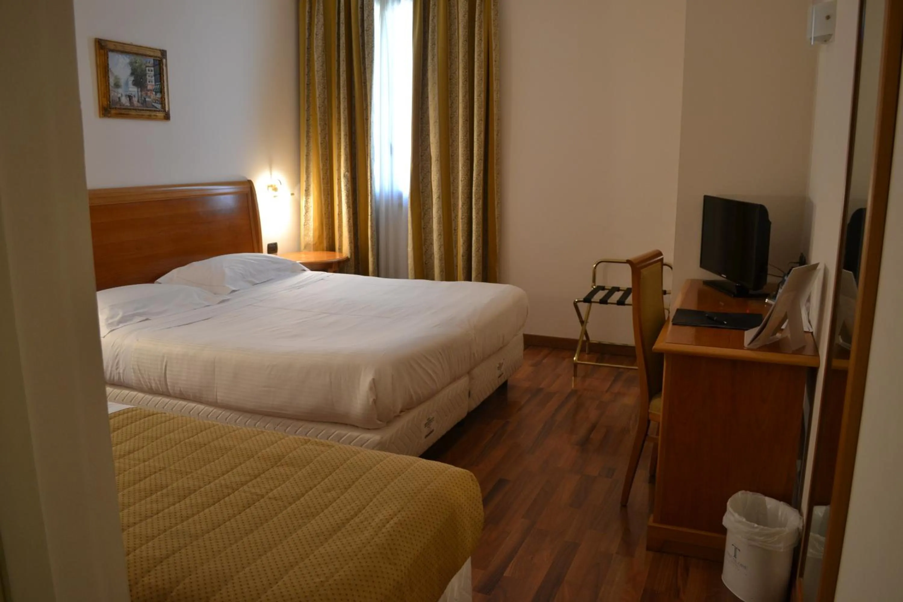 Bed in Tricolore Hotel