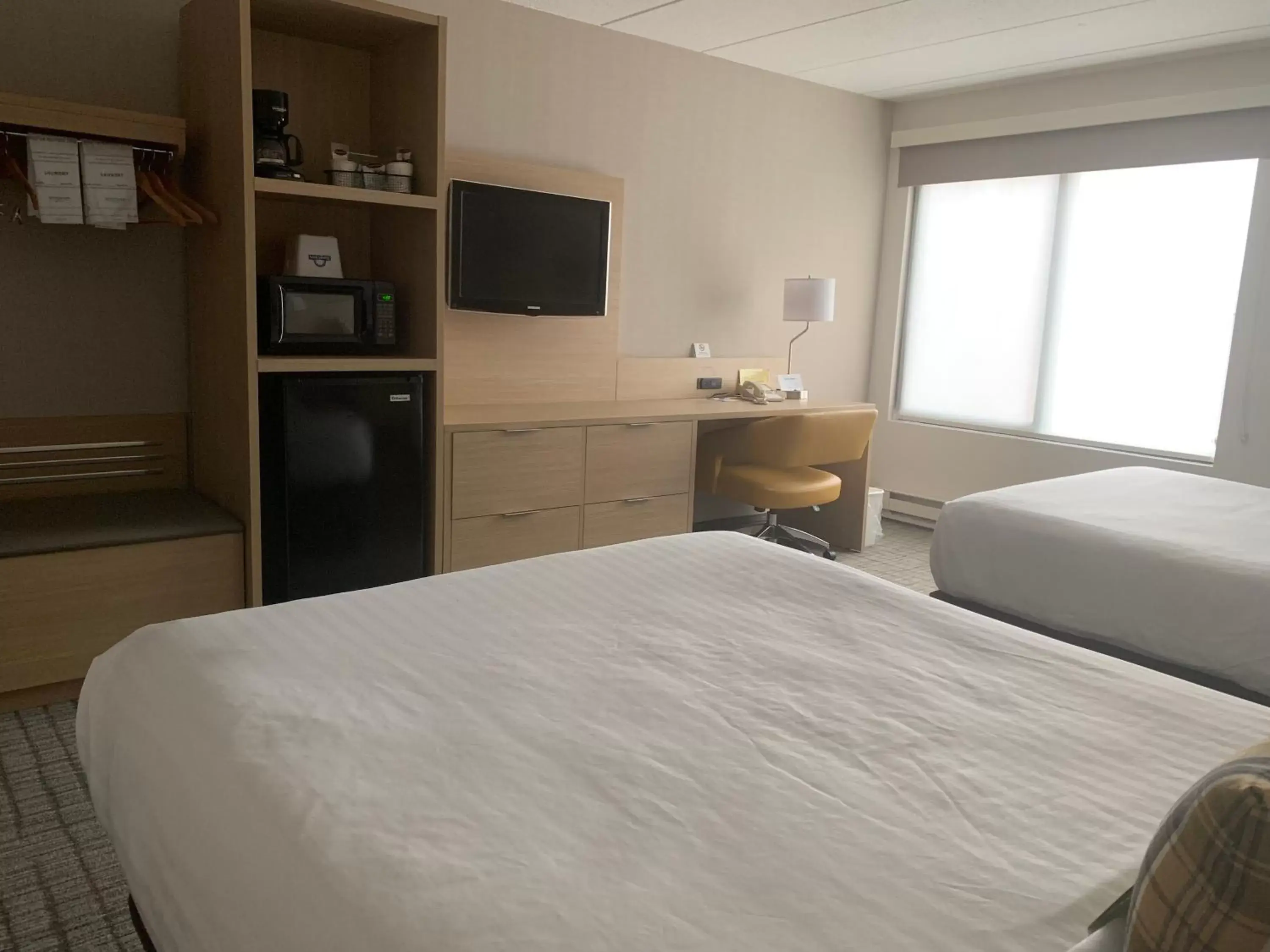 Photo of the whole room, Bed in Days Inn & Suites by Wyndham Duluth by the Mall